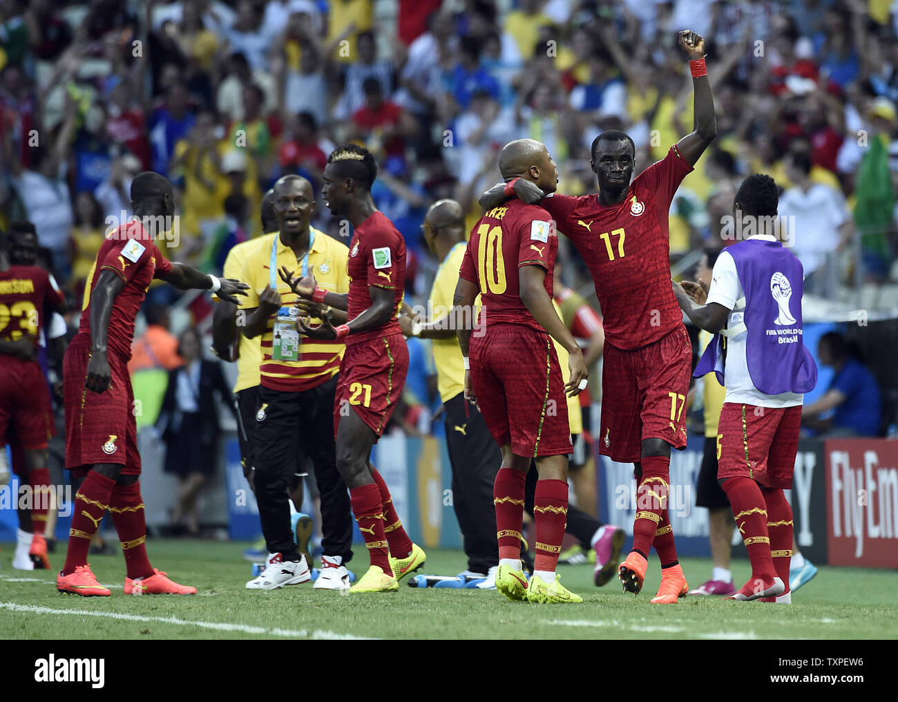 Mohammed Rabiu Andrew Ayew of Ghana is congratulated by team-mate Mohammed Rabiu (R ...