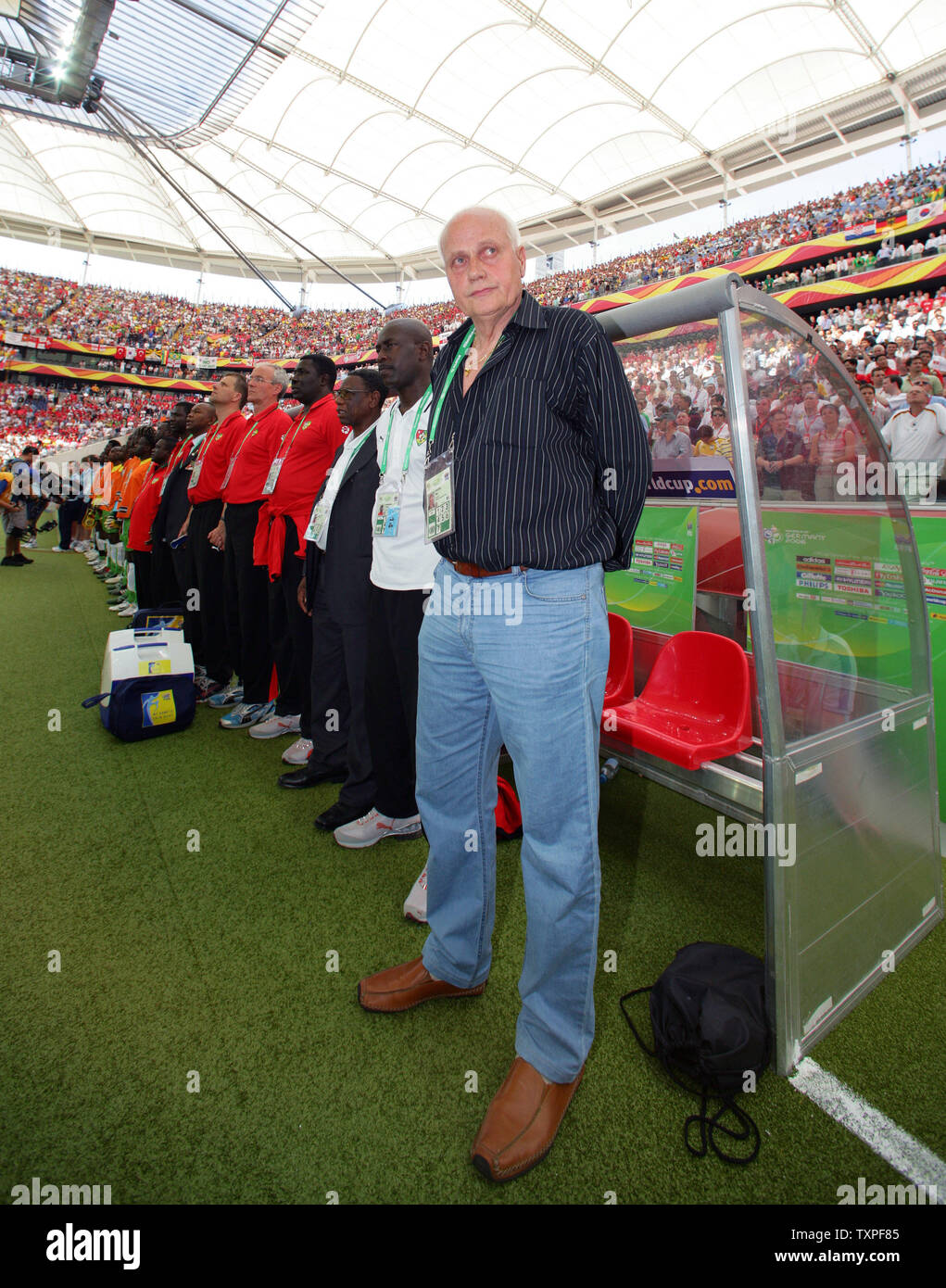 Togo coach Otto Pfister stands on the sidelines in the stadium at the FIFA  World Cup soccer against Korea in Frankfurt, Germany on June 13, 2006.  The Korea Republic defeated Togo 2-1.  (UPI  Photo/Hans Rauchensteiner) Stock Photo