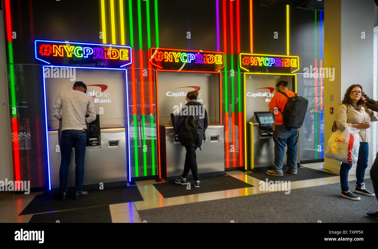 A branch of Capital One Bank in Union Square in New York is enthusiastically decorated for Stonewall 50/ Pride Month on Friday, June 14, 2019.  (© Richard B. Levine) Stock Photo