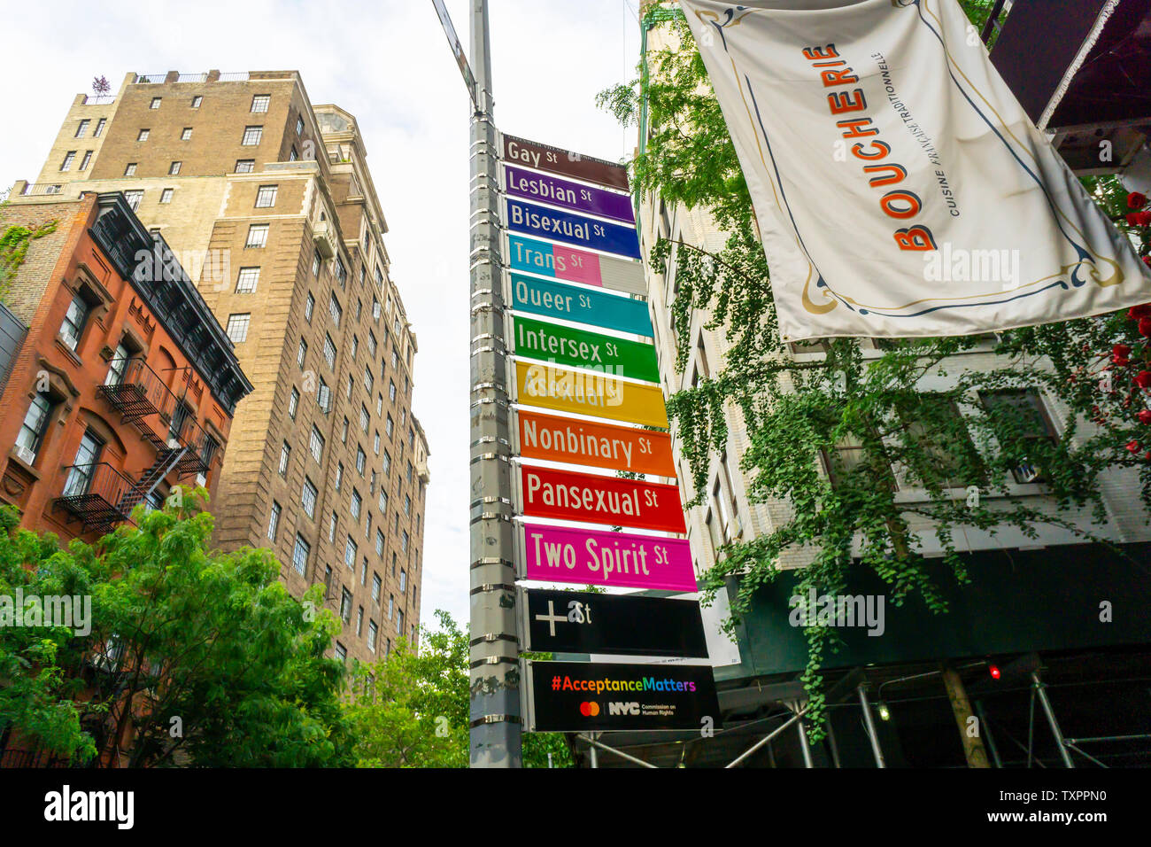 Commemorative street signs at the intersection of Gay and Christopher Streets in Greenwich Village in New York on Monday, June 17, 2019 display alternative gender identities for Stonewall 50/ World Pride. Sponsored by Mastercard to promote their “True Name” initiative, the change in protocol enables members of the LGBTQ community to choose their name on their credit, debit or prepaid card. (© Richard B. Levine) Stock Photo
