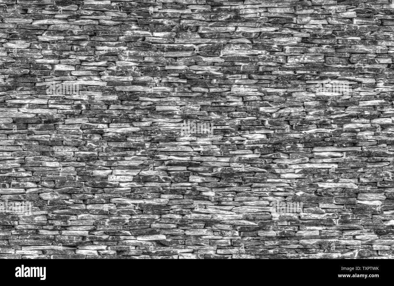 Stone wall background in black and white Stock Photo - Alamy