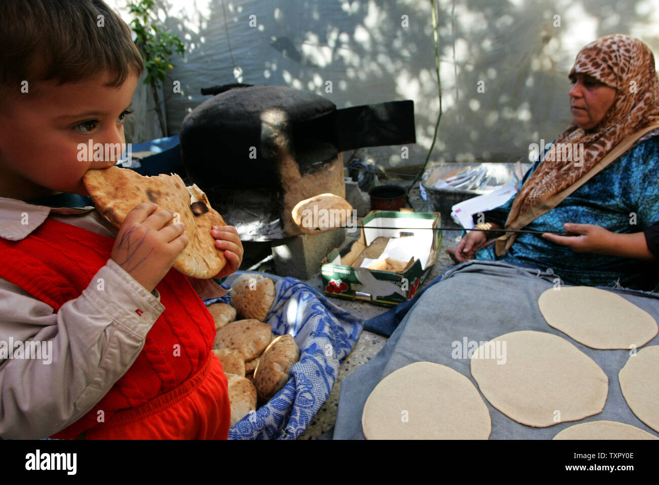 Bread going to the oven hires stock photography and images Alamy