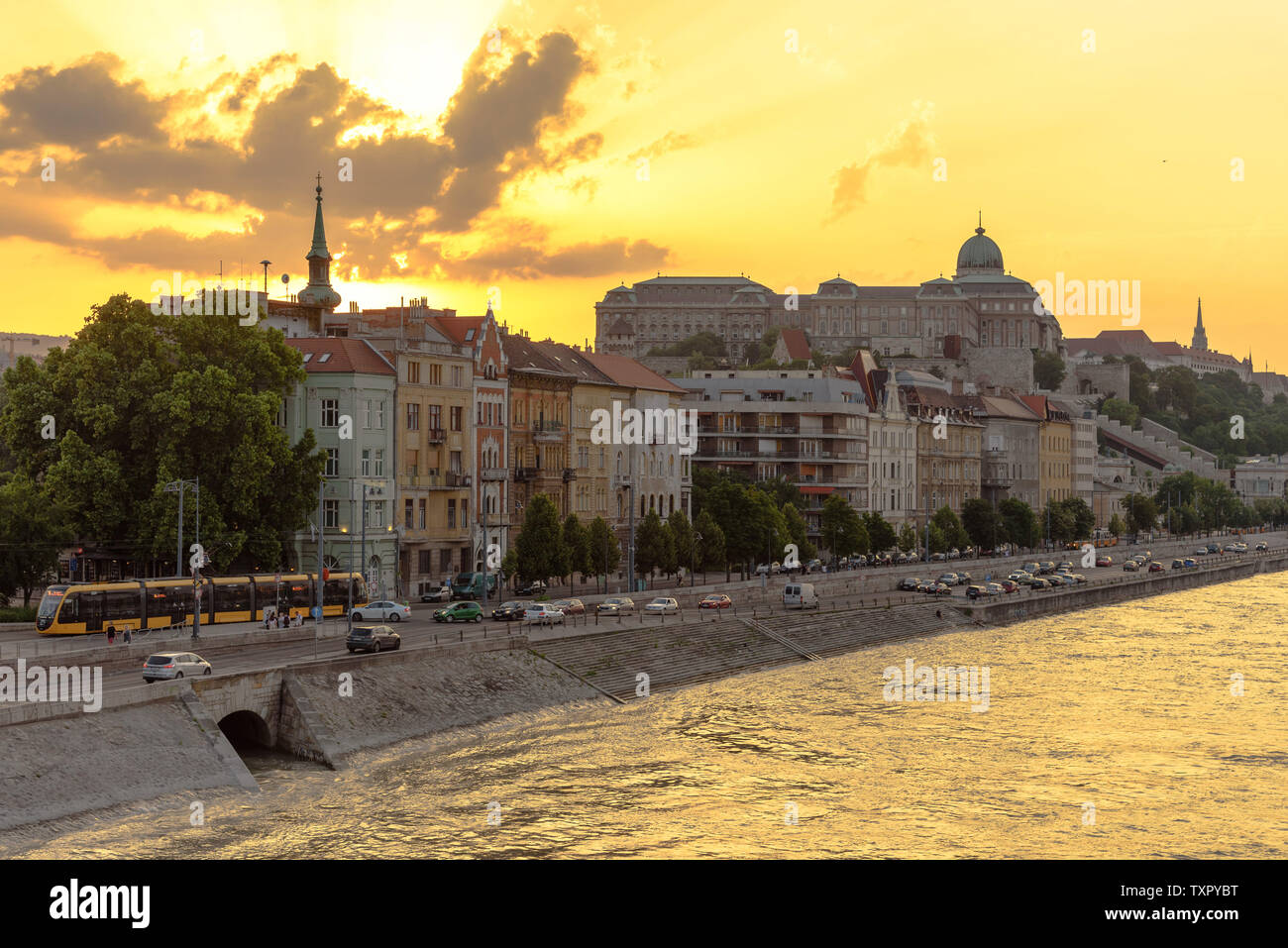The Royal Palace in Budapest at sunset with the Danube River Stock ...