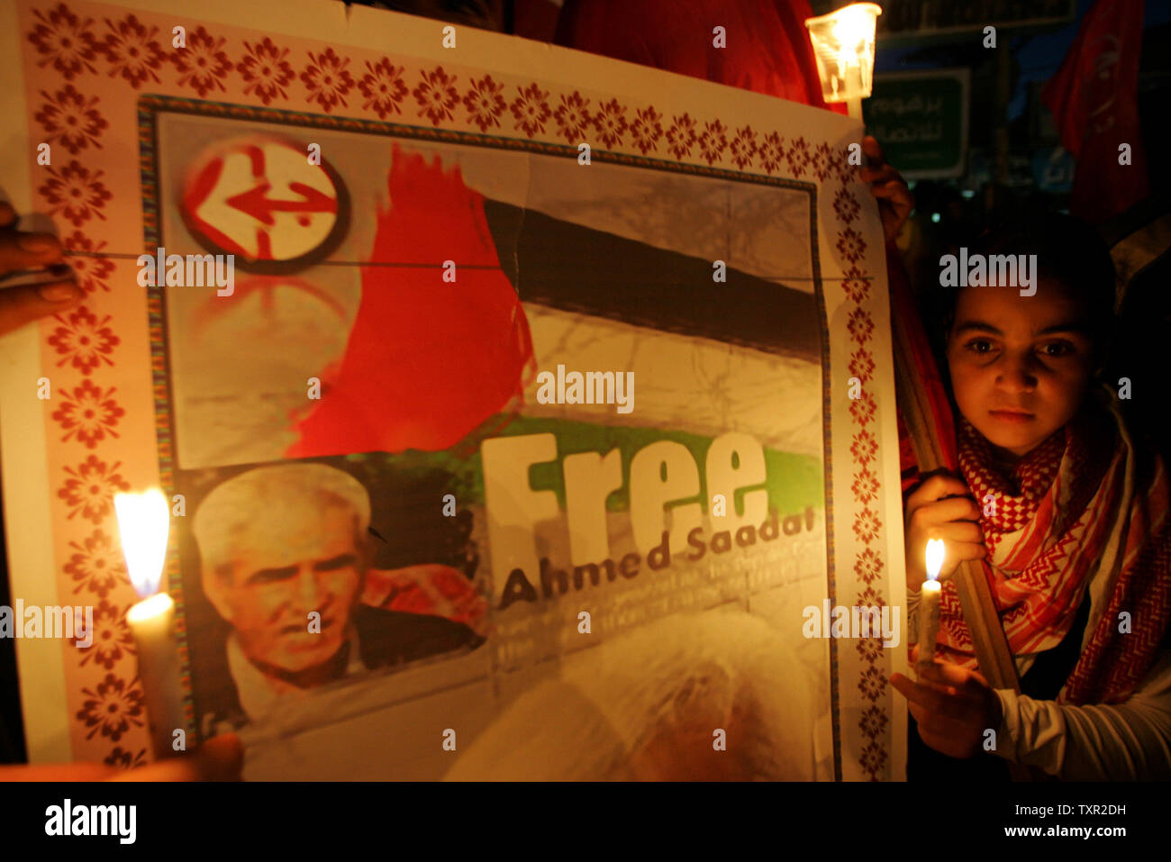 Palestinians take part in a candlelight vigil to mark Palestinian Prisoners Day in Rafah in the southern Gaza Strip on April 17, 2010. Hamas and Fatah closed ranks to mark Palestinian Prisoners Day in the first joint initiative by the bitter rivals since the latter was routed from Gaza in 2007.  UPI/Ismael Mohamad Stock Photo