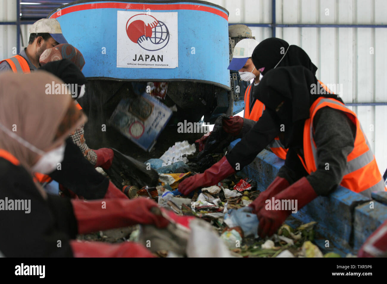 Palestinian Workers Sort Solid Waste For Production Of Compost At A Station In Rafah Southern Gaza On October 7 2012 The United Nations Development Program Undp And International Donors Fund Several Projects