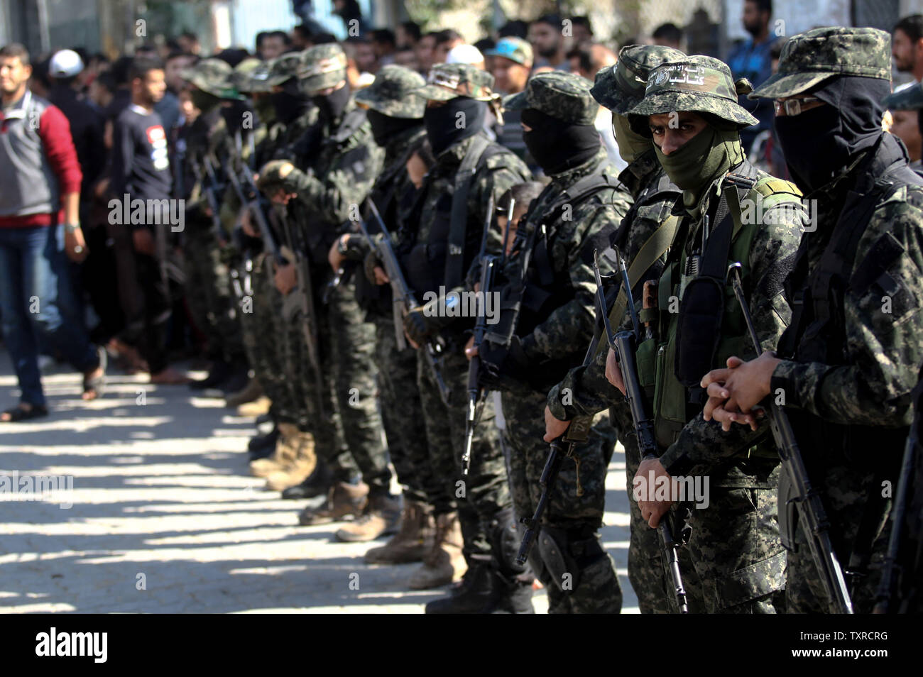 Palestinian Militants Of The Islamist Movement Hamas Military Wing Al Qassam Brigades Attend The Funeral Of
