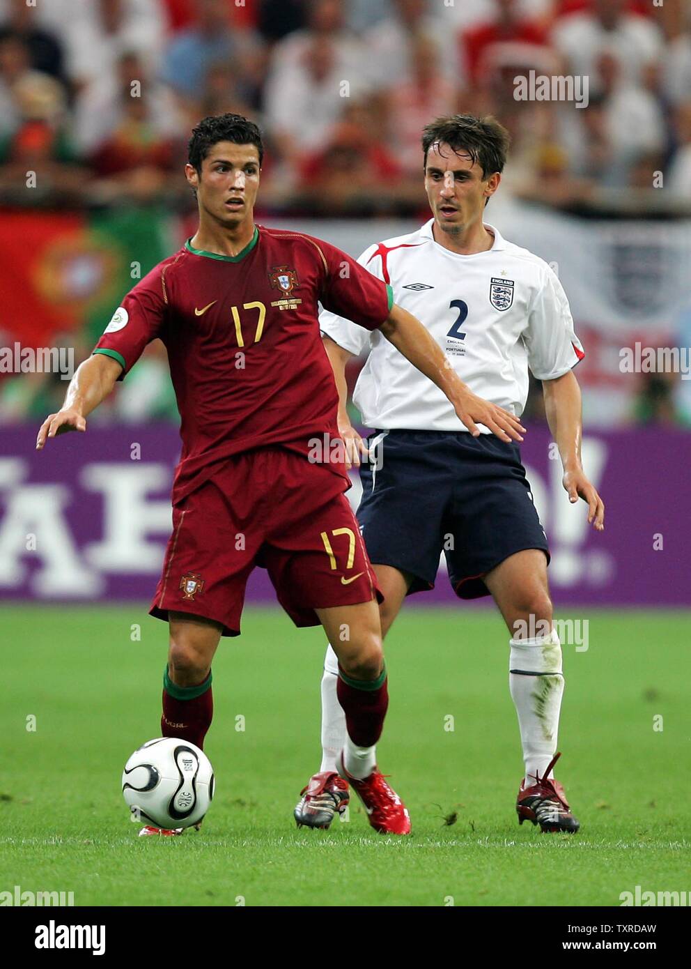 England's Gary Neville and Portugal's Cristiano Ronaldo during the quarter final match of the FIFA World Cup Germany 2006 at the Arena AufSchalke in Gelsenkirchen on July 1, 2006.  England defeated Portugal  4-2.    (UPI  Photo/Chris Brunskill) Stock Photo