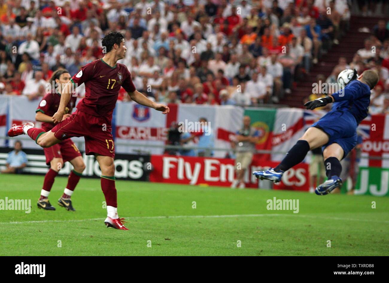 England's Goalkeeper Paul Robinson saves from Portugal's Cristiano Ronaldo during the penalty shoot-out at the quarter final match of the FIFA World Cup Germany 2006 at the Arena AufSchalke in Gelsenkirchen on July 1, 2006.  Portugal won on penalty kicks 3-1 after the match was tied 0-0 in regulation.    (UPI  Photo/Chris Brunskill) Stock Photo