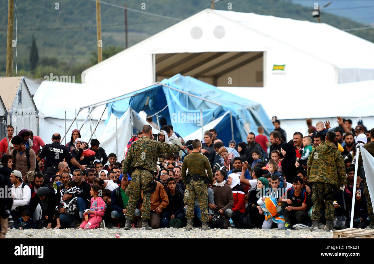 Migrants and refugees are seen on the border near the town of Gevgelija, Macedonia,  September 7, 2015 as they are waiting for permission to get into the country. The Gevgelija-Presevo journey is just a part of the journey of hundreds of refugees, the vast majority of them from Syria, who are forced to make a long journey through what is called the Balkan corridor, which takes them from Turkey, across Greece, Macedonia and Serbia to Hungary, the gateway to the European Union.    Photo by Borce Popovski/UPI Stock Photo