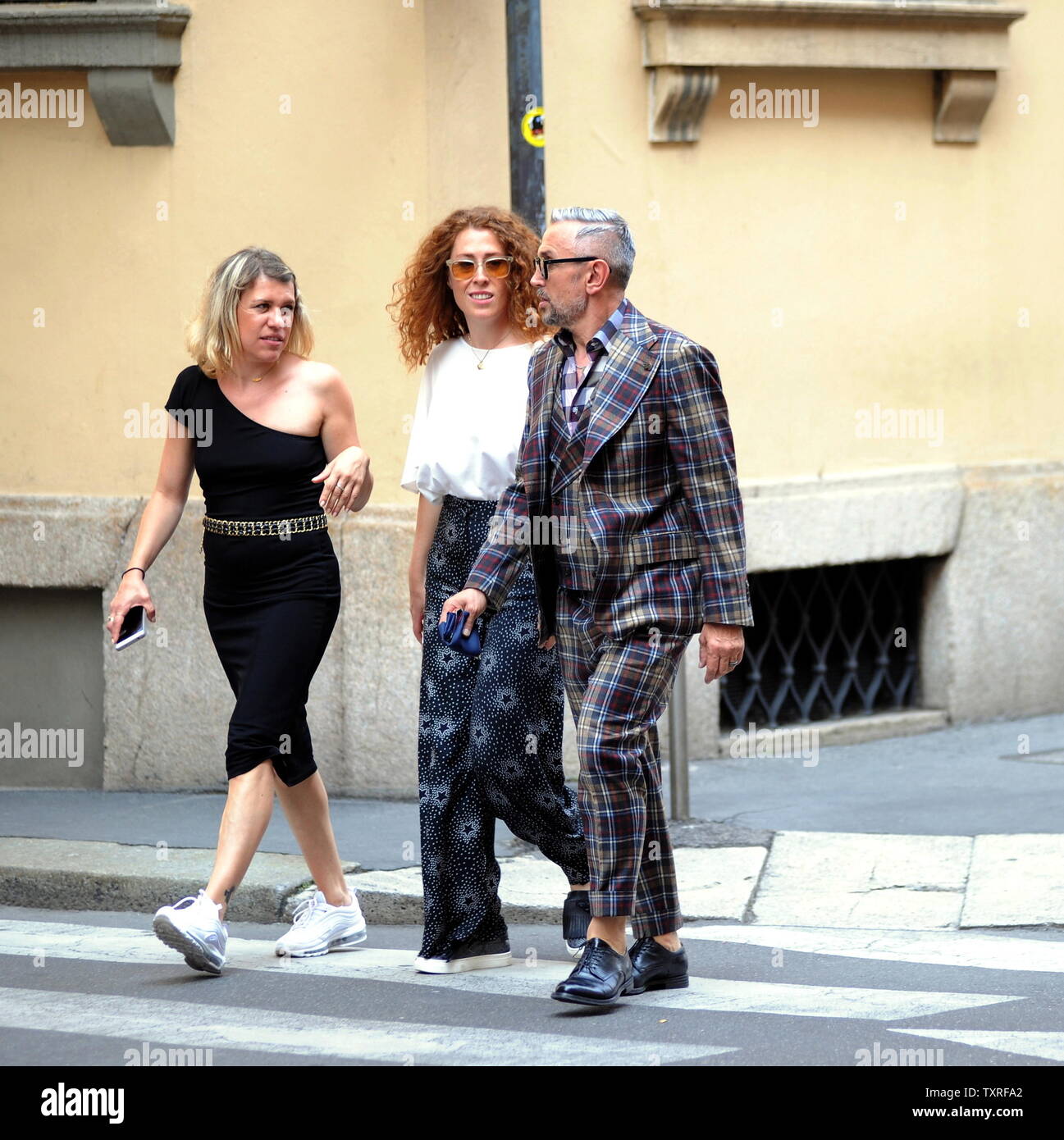 Milan, Bruno Barbieri in the center to shoot a new Masterchef commercial  Chef BRUNO BARBIERI arrives downtown accompanied by two production girls  and heads for ARMANI's restaurant in Via Manzoni, where the