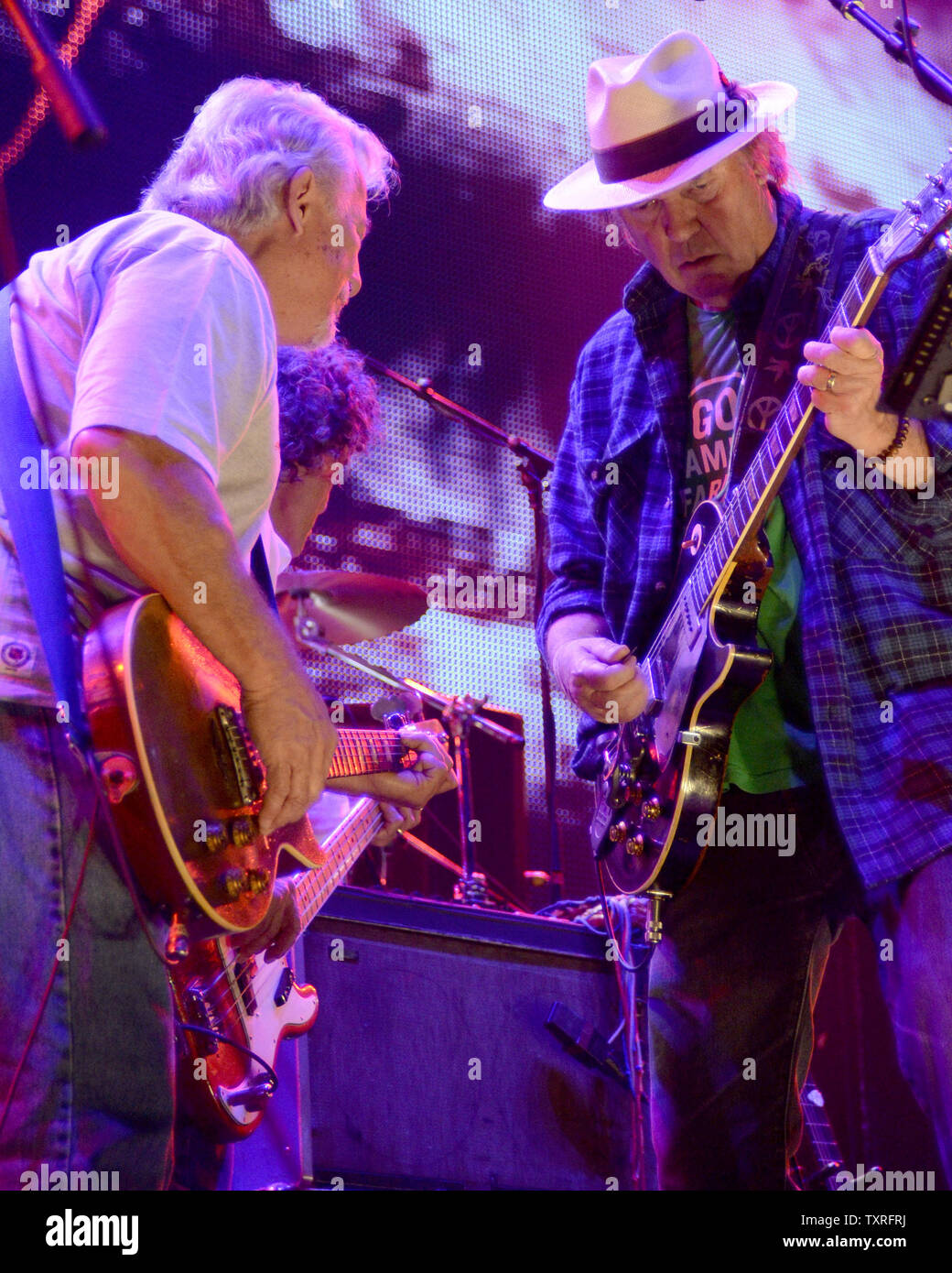 Neil Young and Crazy Horse performs at the Farm Aid 2012 concert at the