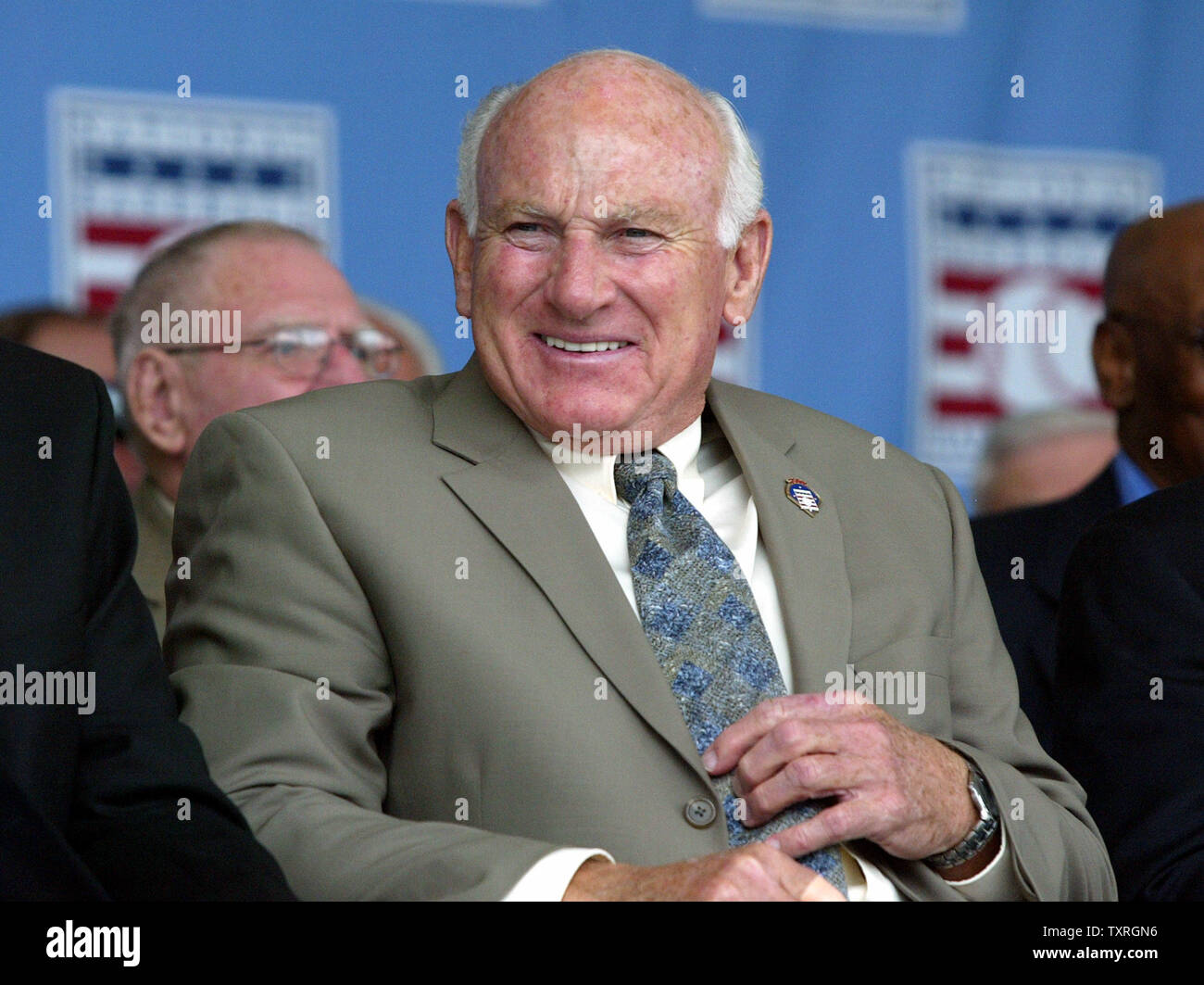 Baseball Hall of Fame member Harmon Killebrew enjoys the induction ceremonies for Paul Molitorr and Dennis Eckersley  in Cooperstown, NY on July 25, 2004.  (UPI Photo/Bill Greenblatt) Stock Photo