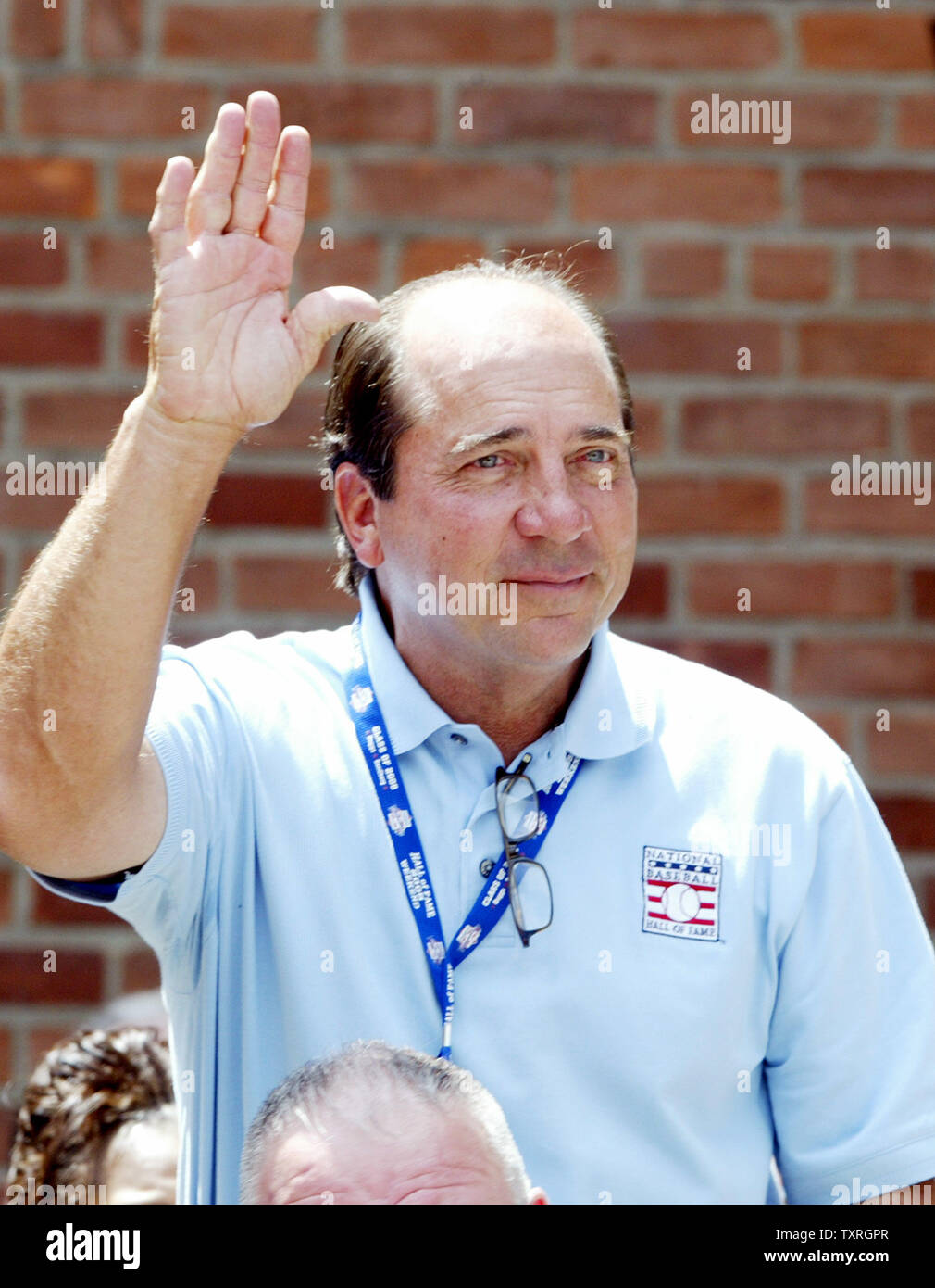 Baseball Hall of Famer Johnny Bench waves to fans during a rededication of  the National Baseball Hall of Fame and Museum building in Cooperstown, NY  on July 29, 2005. This year former