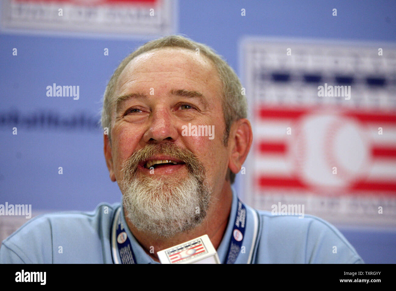 Former St. Louis Cardinals and National Baseball Hall of Fame inductee  Bruce Sutter smiles during a press conference in Cooperstown, NY on July  29, 2006. Sutter and 17 others that were involved