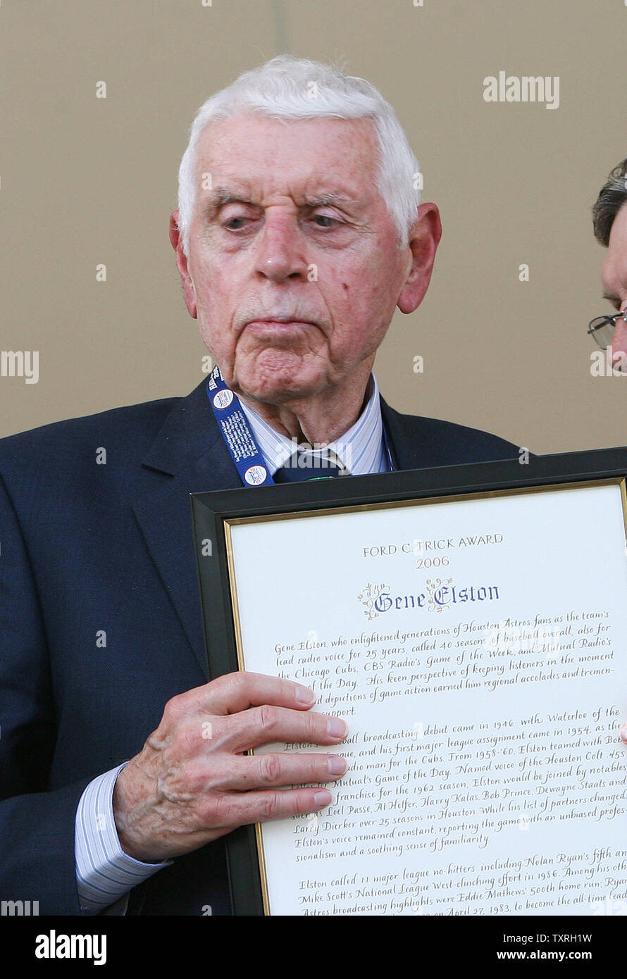Longtime voice of the Houston Astros Gene Elston holds the Ford C. Frick Award after receiving it at induction ceremonies for the National Baseball Hall of Fame in Cooperstown, NY on July 30, 2006.  (UPI Photo/Bill Greenblatt) Stock Photo