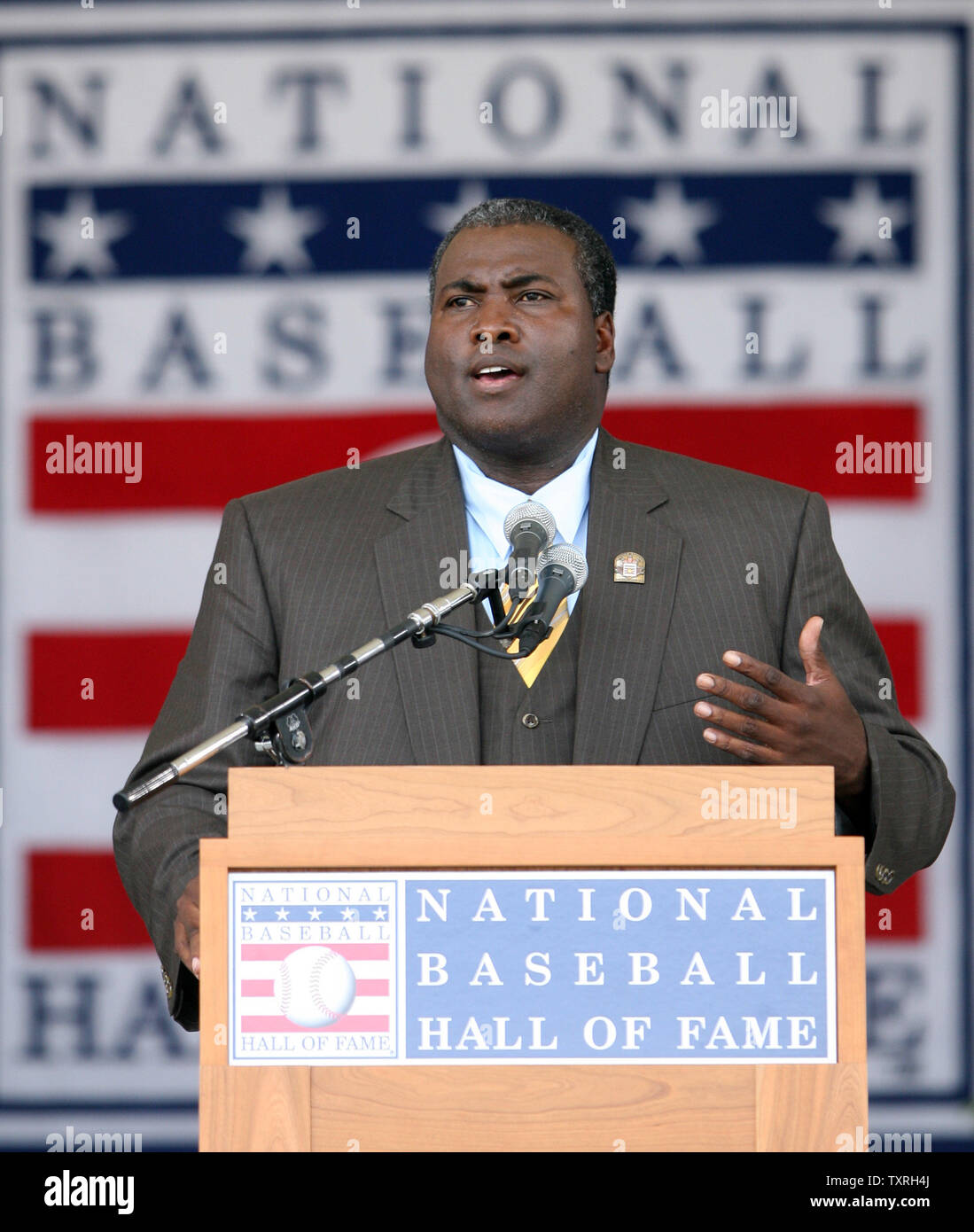 Alicia Gwynn, wife of National Baseball Hall of Fame inductee Tony Gwynn,  smiles as her husband delivers his induction speech in Cooperstown, N.Y.,  Sunday, July 29, 2007. Gwynn spent his Major League