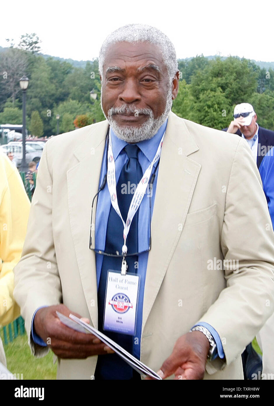 Former National League President Bill White arrives for the National