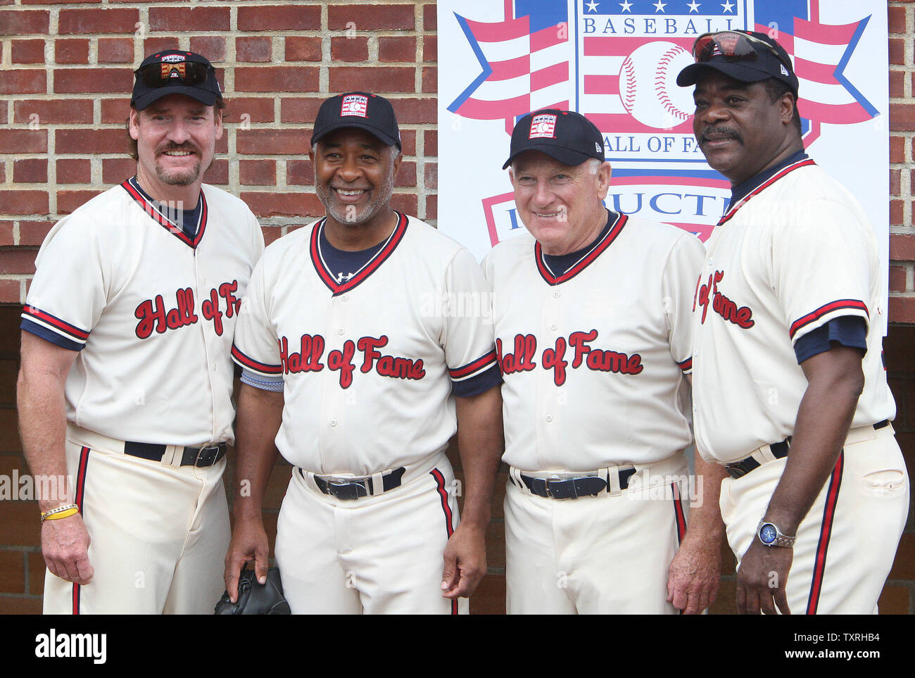 Members of the National Baseball Hall of Fame (L to R) Wade Boggs, Ozzie Smith, Harmon Killebrew and Eddie Murray pose together for a photograph following their participation in 'Play Ball,' during Induction week in Cooperstown, New York on July 24, 2009. Former players Rickey Henderson, Jim Rice and Joe Gordon will be welcomed into the hall as the Class of 2009 on July 26. (UPI Photo/Bill Greenblatt) Stock Photo