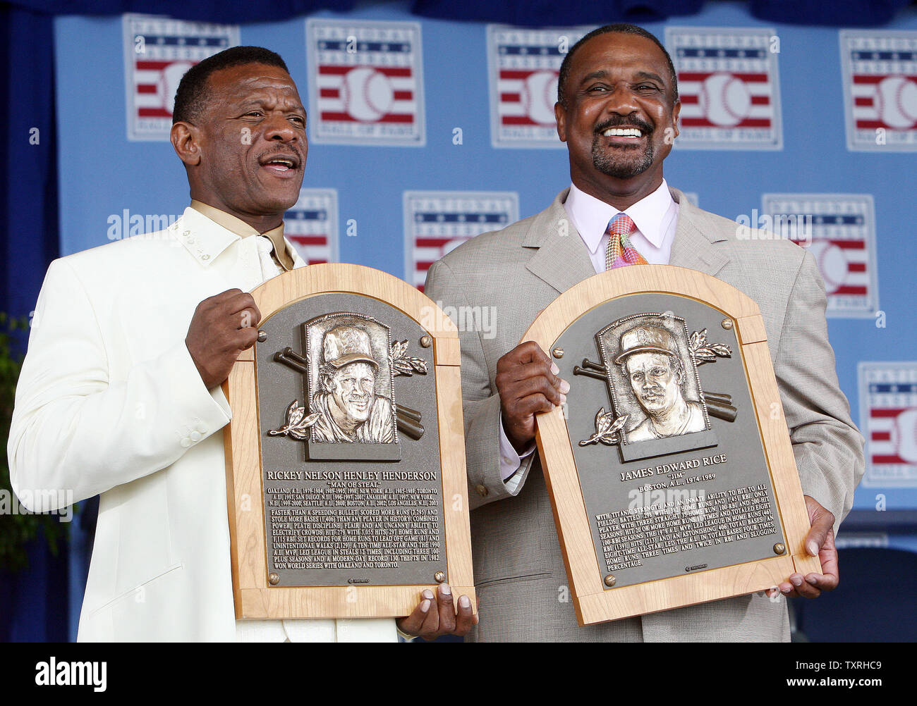 New National Baseball Hall of Fame members Rickey Henderson (L) and Jim Rice smile for photographs following the their induction ceremony in Cooperstown, New York on July 26, 2009.  (UPI Photo/Bill Greenblatt) Stock Photo