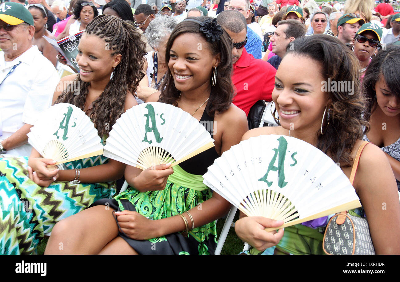 Members of the Rickey Henderson family show off their fans before National  Baseball Hall of Fame induction ceremonies for Henderson and Jim Rice in  Cooperstown, New York on July 26, 2009. (UPI