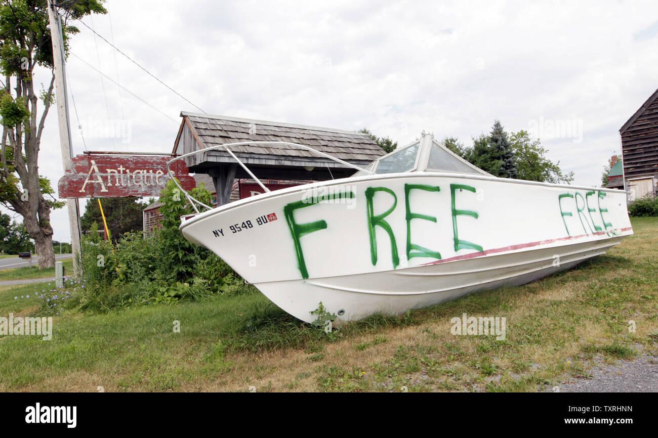 Owners of the Dutch Barn Antique Shop along Highway 20 in Carlisle, New York are advertising a free boat in front of their store on July 25, 2011. UPI/Bill Greenblatt Stock Photo