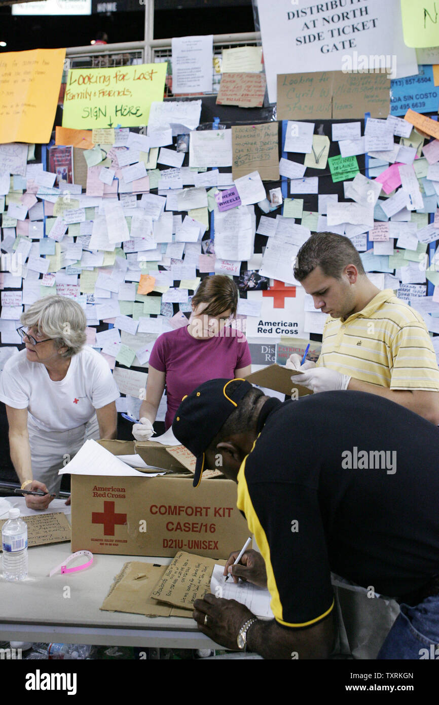 A hurricane Katrina refugee fills out a form at a station set up to help victims find lost family and friends in the Astrodome in Houston, Texas on Friday, September 2, 2005. (UPI Photo/Chris Carson) Stock Photo