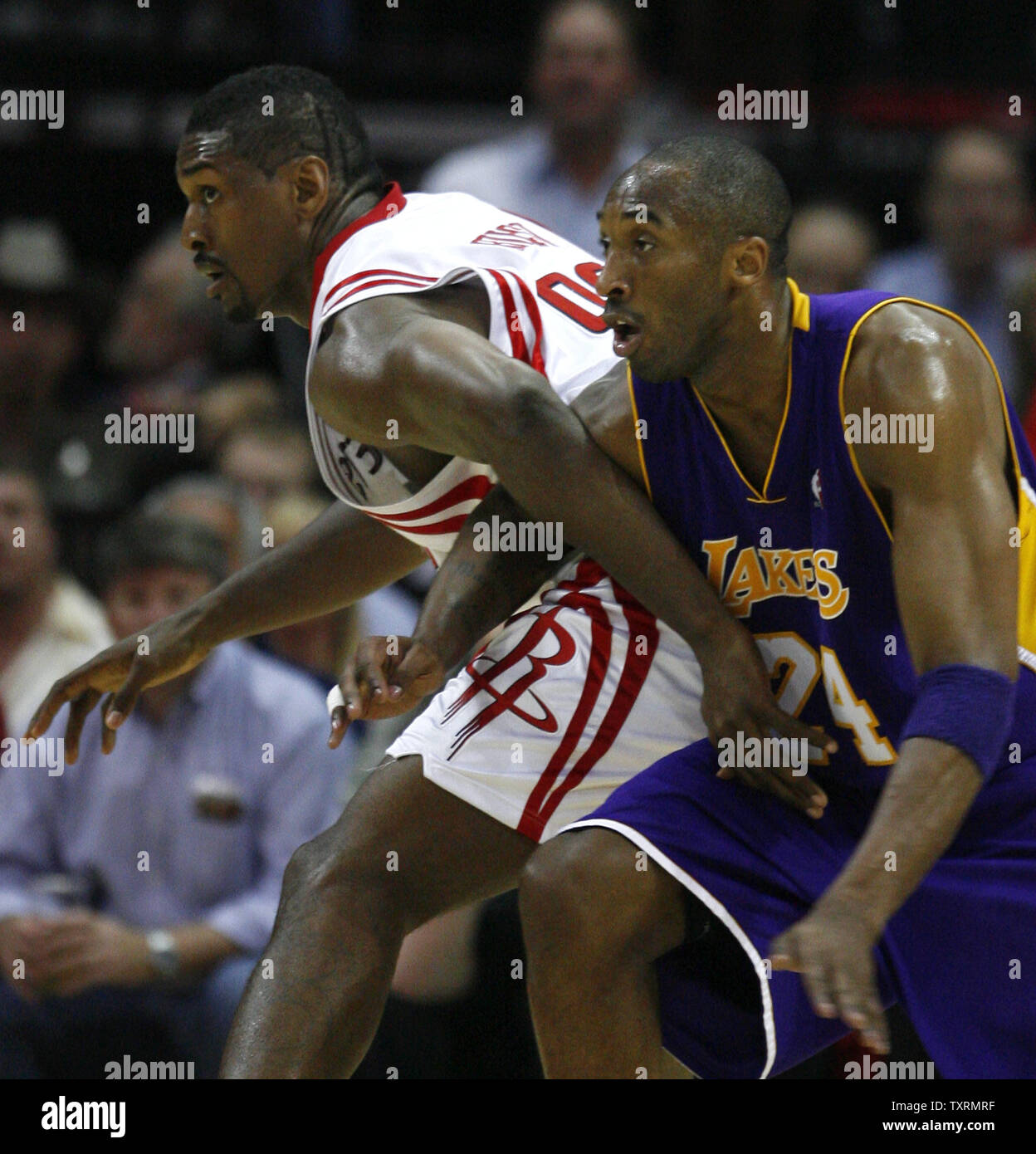 Houston Rockets guard Ron Artest  (L) tries to get away from the defense of Los Angeles Lakers guard Kobe Bryant in the second half of Game 3 of the Western Conference semifinals at Toyota Center in Houston, Texas on May 8, 2009. The Lakers defeated the Rockets 108-94 to take a 2-1 lead in their best-of-seven series. (UPI Photo/Aaron M. Sprecher) Stock Photo