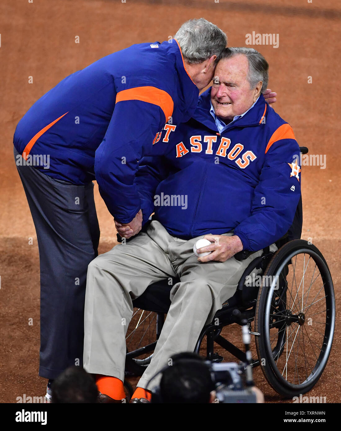 Former U.S. Presidents George W. Bush and George H.W. Bush throw out ...