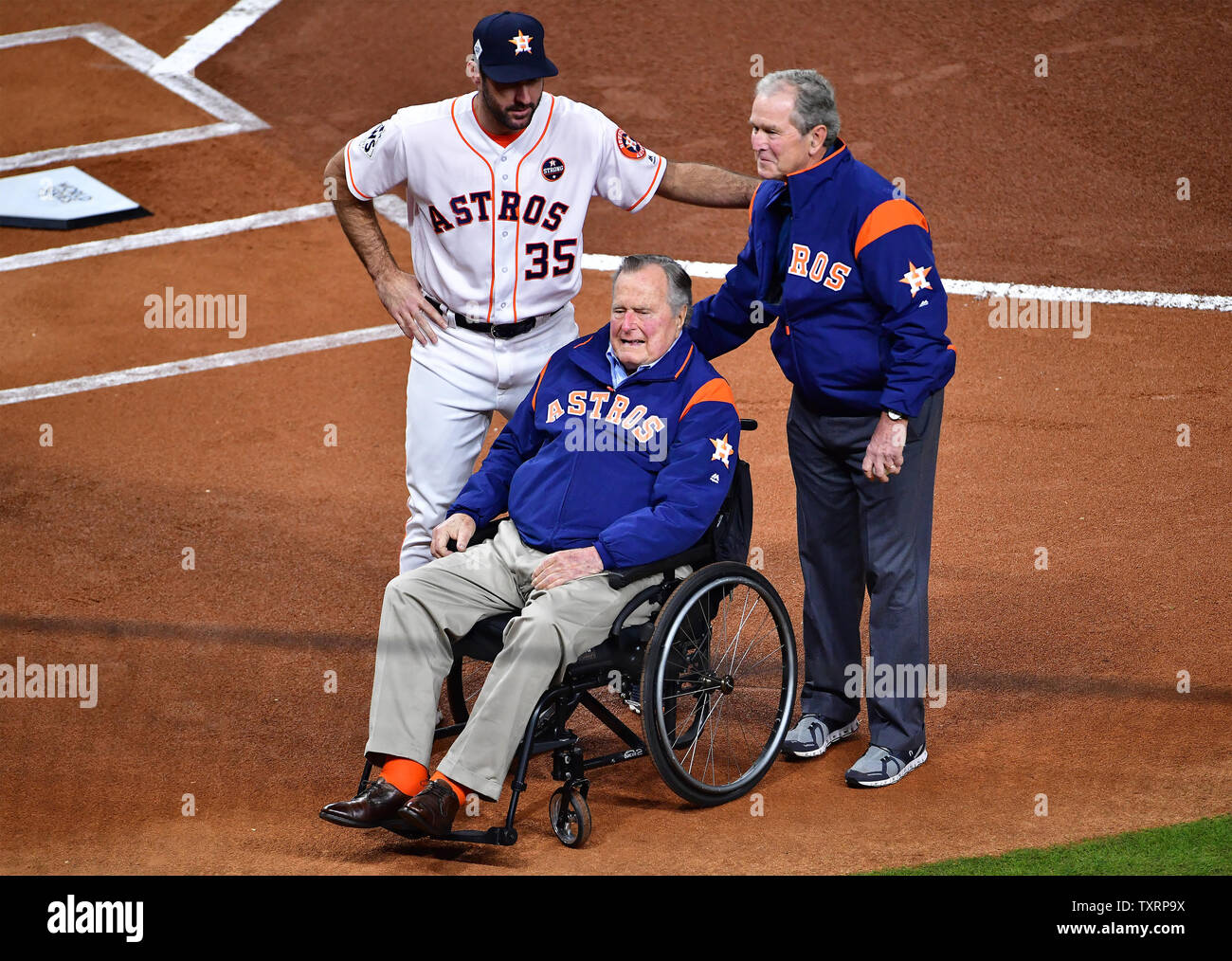 Former U.S. Presidents George W. Bush and George H.W. Bush throw out ...