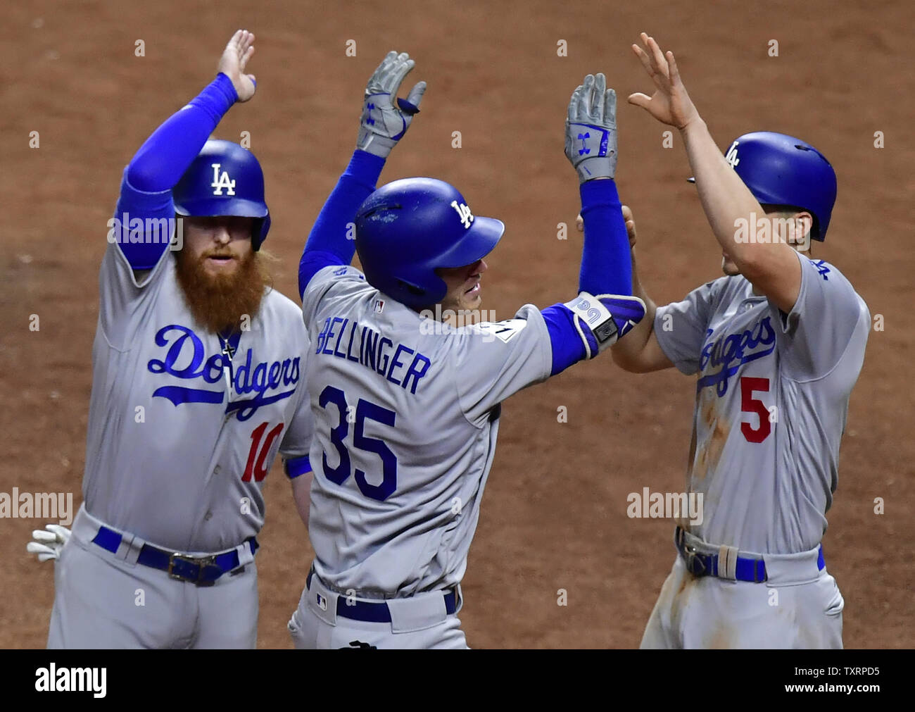 Los Angeles Dodgers Cody Bellinger (35) celebrates his three-run