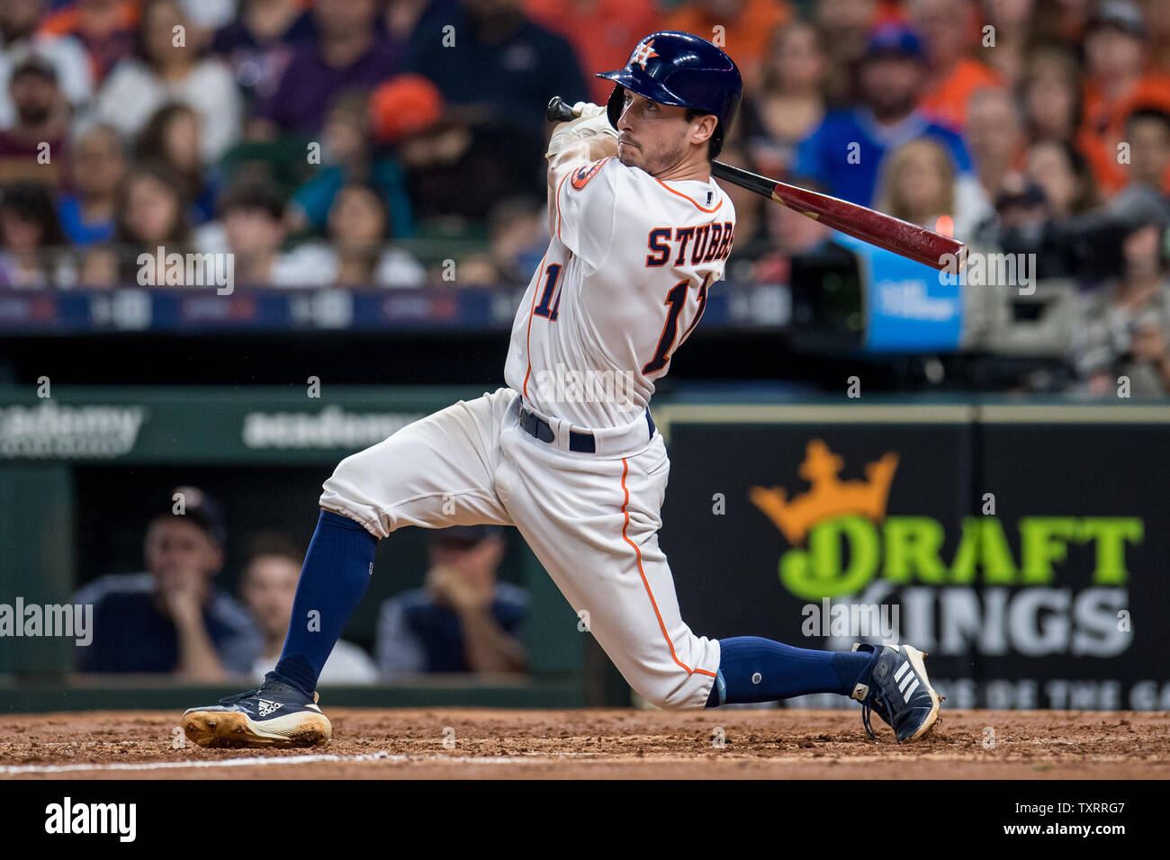 Houston Astros' Garrett Stubbs hits a double in his first major league  at-bat during a game against the Chicago Cubs in the 2nd inning at Minute  Maid Park in Houston on May