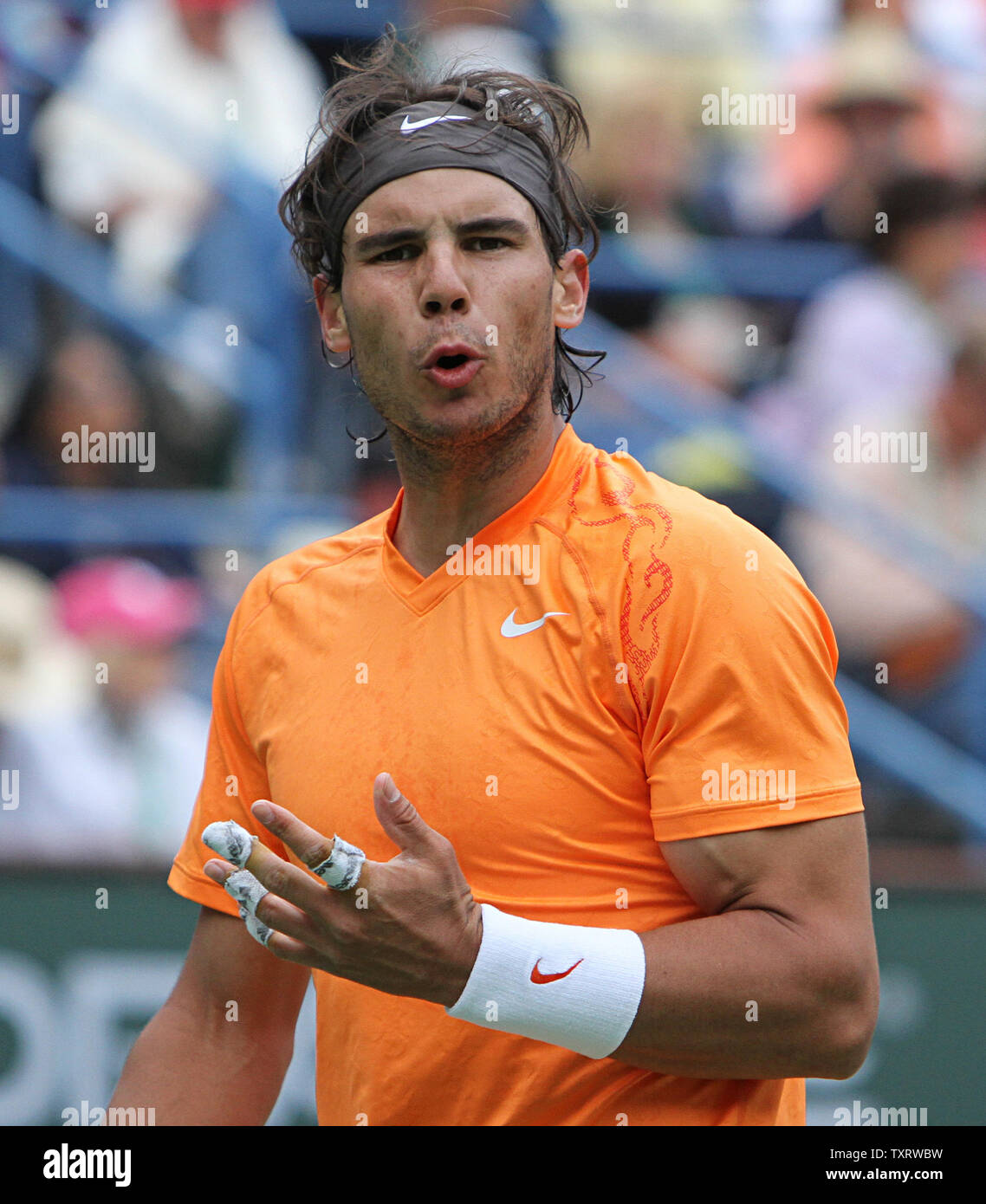 Spaniard Rafael Nadal reacts after a shot during his mens final match against Serbian Novak Djokovic at the BNP Paribas Open in Indian Wells, California on March 20, 2011.  Djokovic defeated Nadal 4-6, 6-3, 6-2 to win the tournament.   UPI/David Silpa Stock Photo