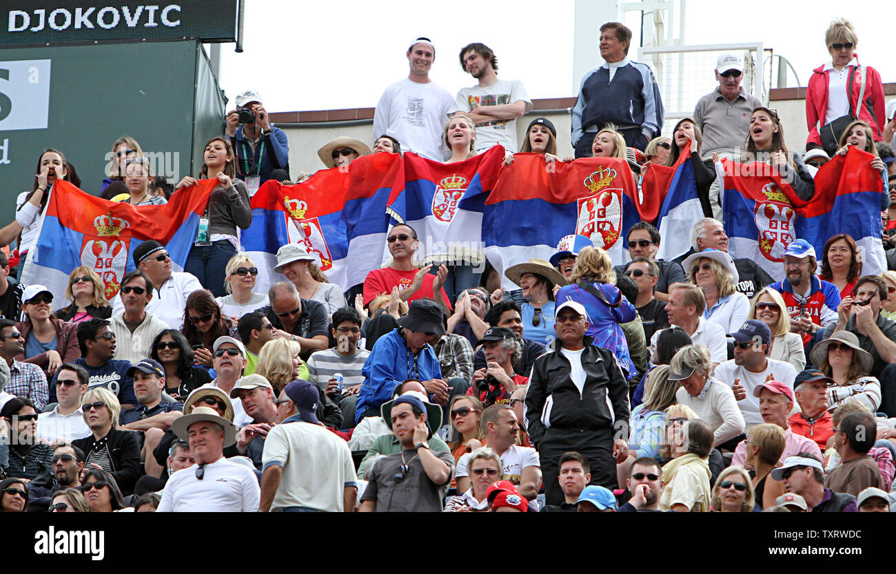 Supporters of Serbian Novak Djokovic cheer during his mens final match against Spaniard Rafael Nadal at the BNP Paribas Open in Indian Wells, California on March 20, 2011.  Djokovic defeated Nadal 4-6, 6-3, 6-2 to win the tournament.   UPI/David Silpa Stock Photo