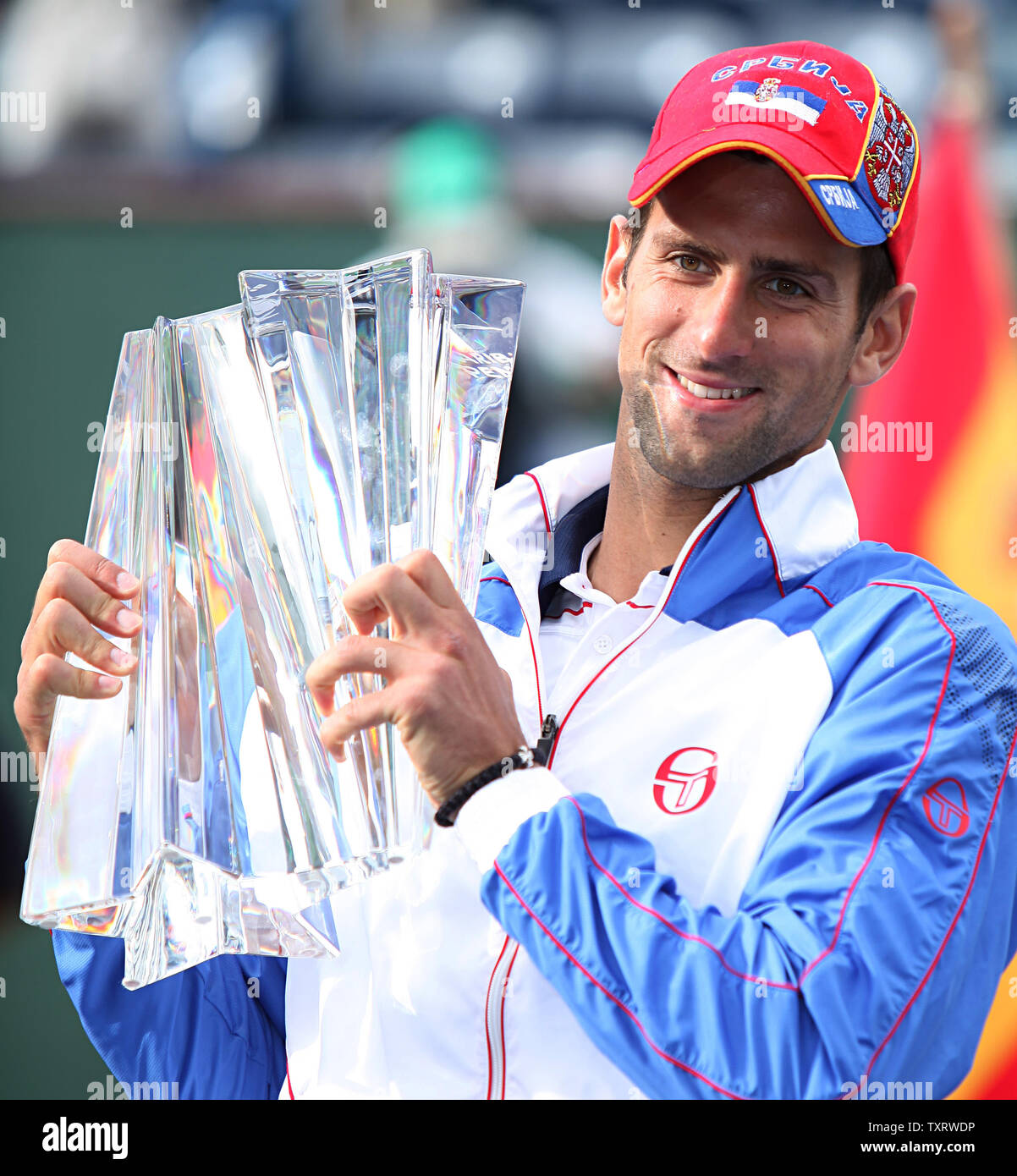 Serbian Novak Djokovic holds the championship trophy after winning his mens final match against Spaniard Rafael Nadal at the BNP Paribas Open in Indian Wells, California on March 20, 2011.  Djokovic defeated Nadal 4-6, 6-3, 6-2 to win the tournament.   UPI/David Silpa Stock Photo