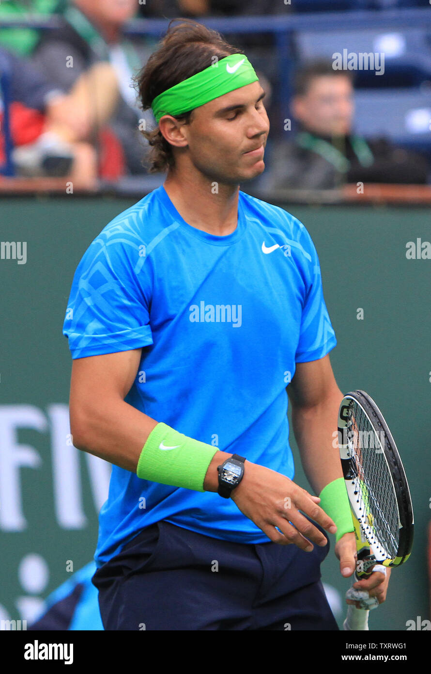 Spaniard Rafael Nadal reacts after a shot during his mens semifinal match  against Roger Federer of Switzerland at the BNP Paribas Open in Indian Wells,  California on March 17, 2012. Federer defeated