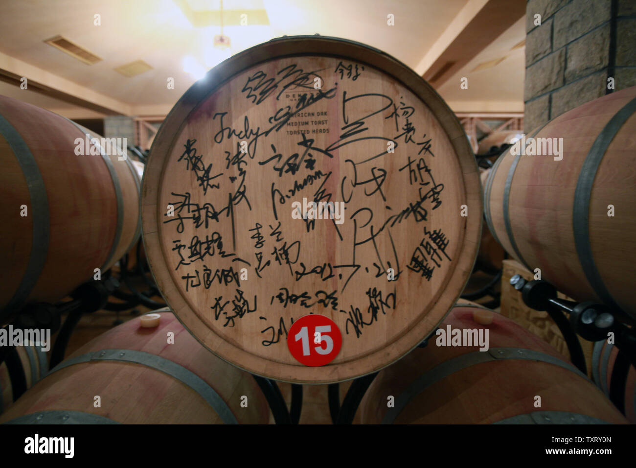 Casks of wine, each individually purchased by customers and companies, rest in the cellar of XiXia Wineries, one of China's top wine makers, in Yinchuan, the capital of China's northwestern Ningxia Hui Autonomous Province on September 16, 2013.   With the Chinese wine market booming, Yinchuan is predicted to become the country's wine capital as considerable foreign and domestic investment flows into the region.  China's wine market is leading the world in growth.   UPI/Stephen Shaver Stock Photo