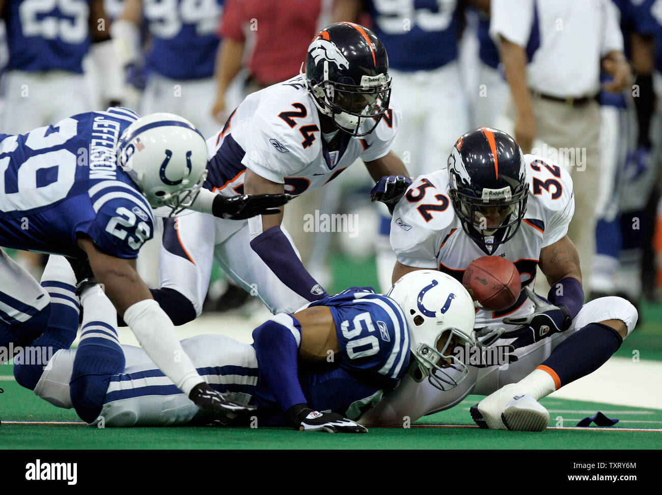 Denver Broncos Chris Young (32), Champ Bailey (24) and Indianpolis