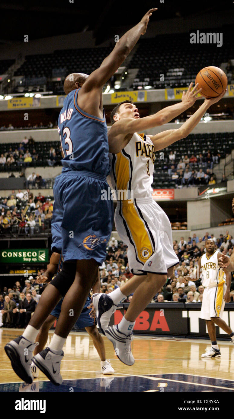 Indiana Pacers guard Sarunas Jasikevivius (3) drives to the basket past Washington Wizards' Brendan Haywood (33) during the first half of their game at Conseco Fieldhouse in Indianapolis, In December 8, 2005. (UPI Photo/Mark Cowan) Stock Photo