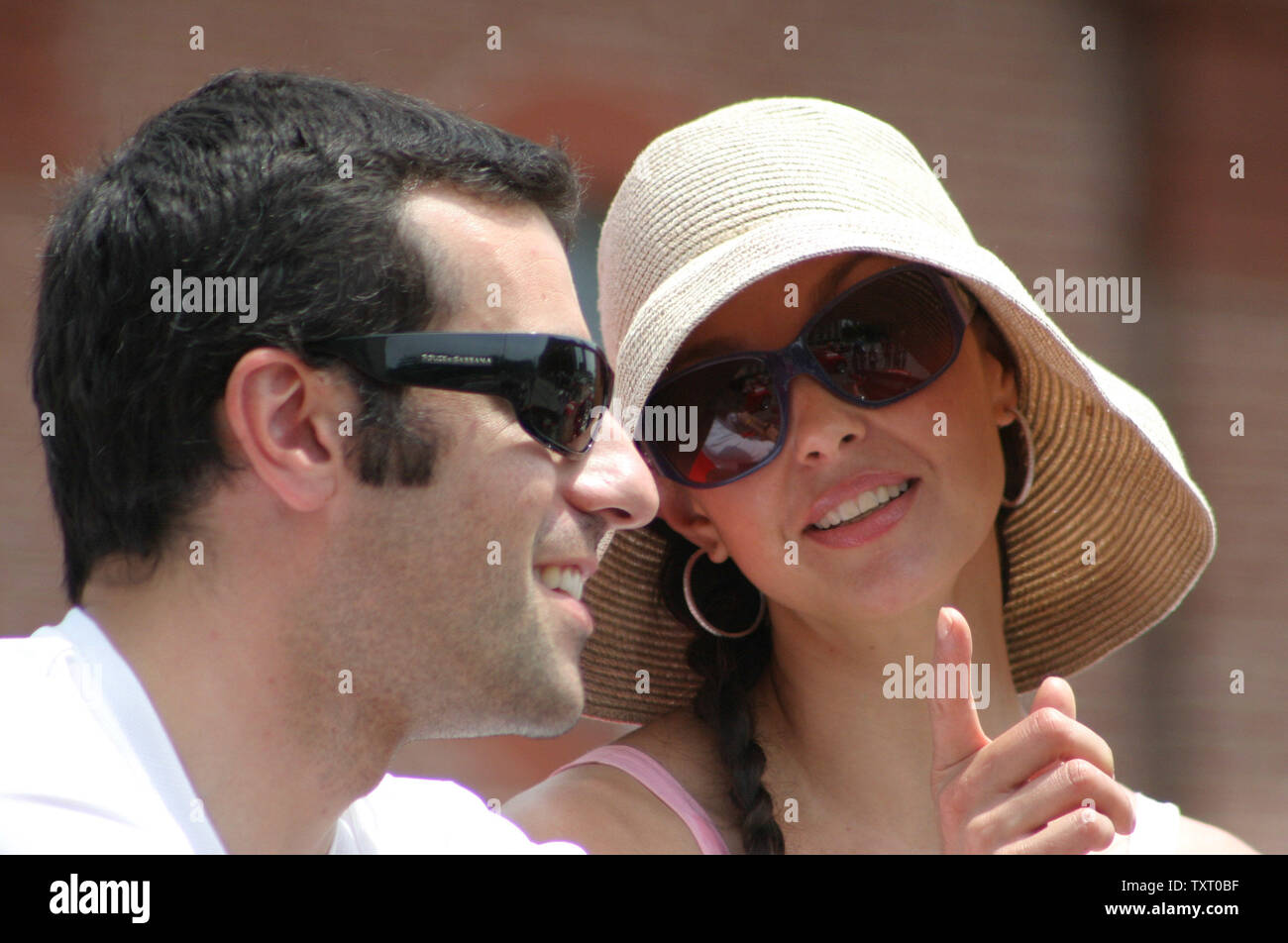 Actress Ashley Judd rides along with her husband race driver Dario Franchitti in the 500