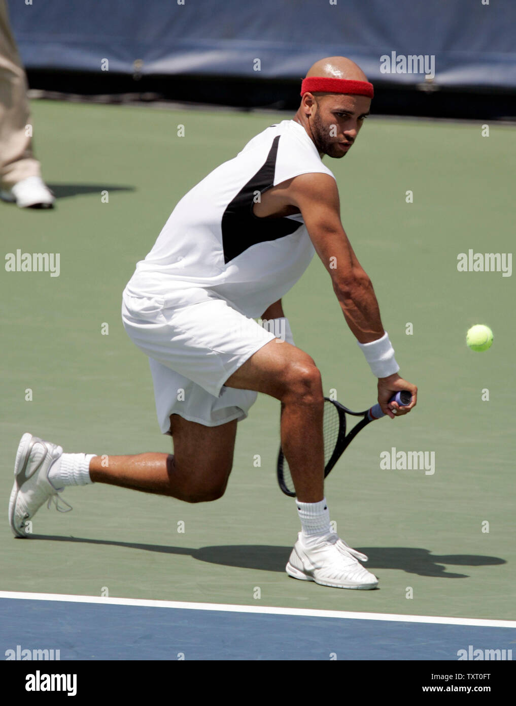 james-blake-hits-a-backhand-against-andy-roddick-in-their-championship-match-blake-defeated-roddick-4-6-6-4-7-6-7-5-in-the-mens-singles-championship-match-at-the-rca-championships-in-indianapolis-in-july-23-2006-upi-photomark-cowan-TXT0FT.jpg