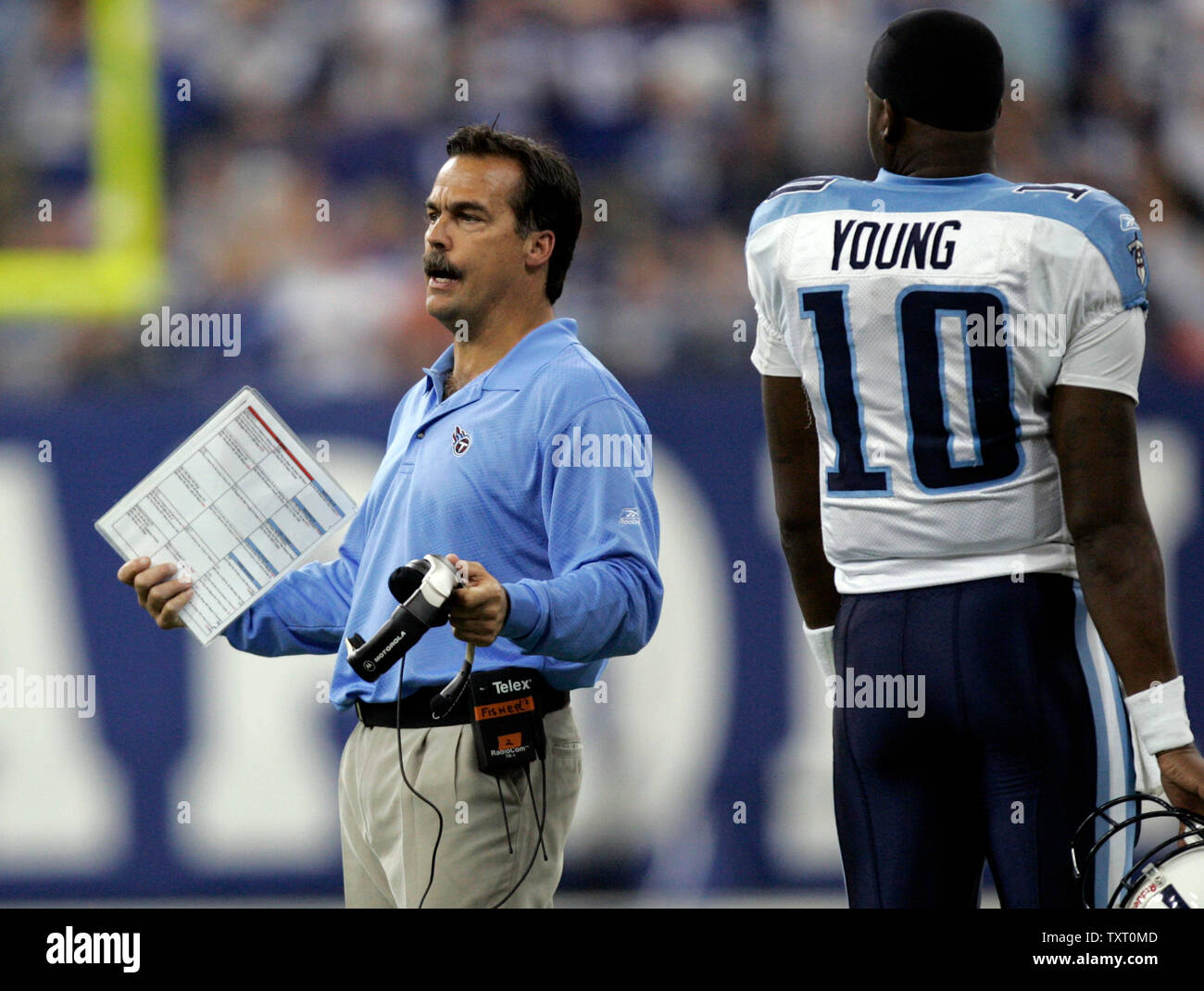 Tennessee Titans head coach Jeff Fisher argues a penalty flag call after quarterback Vince Young (10) called a time-out against the Indianapolis Colts. The Indianapolis Colts defeated the Tennessee Titans 14-13 at the RCA Dome in Indianapolis on October 8, 2006.(UPI Photo/Mark Cowan) Stock Photo