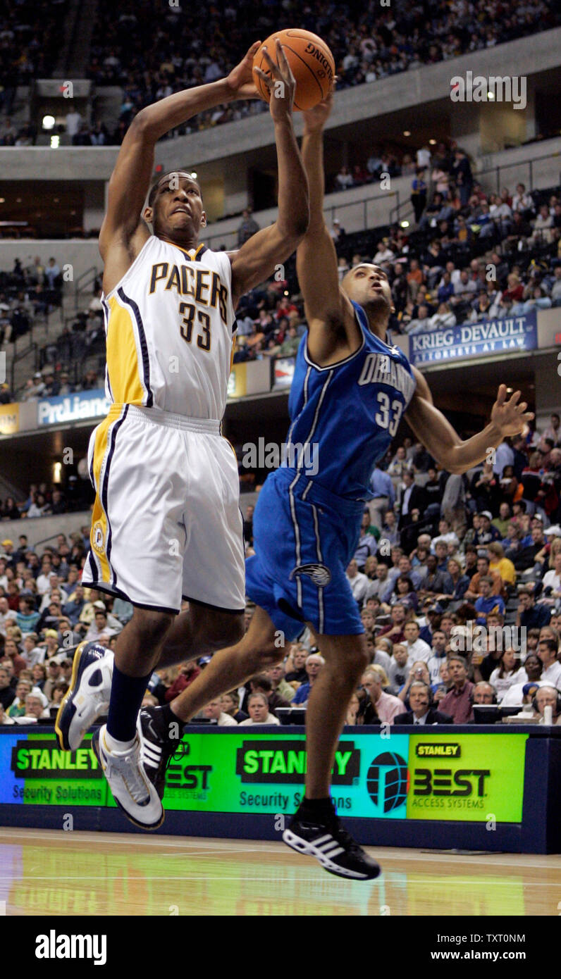 Orlando Magic guard Grant Hill (33), right, blocks a shot by 