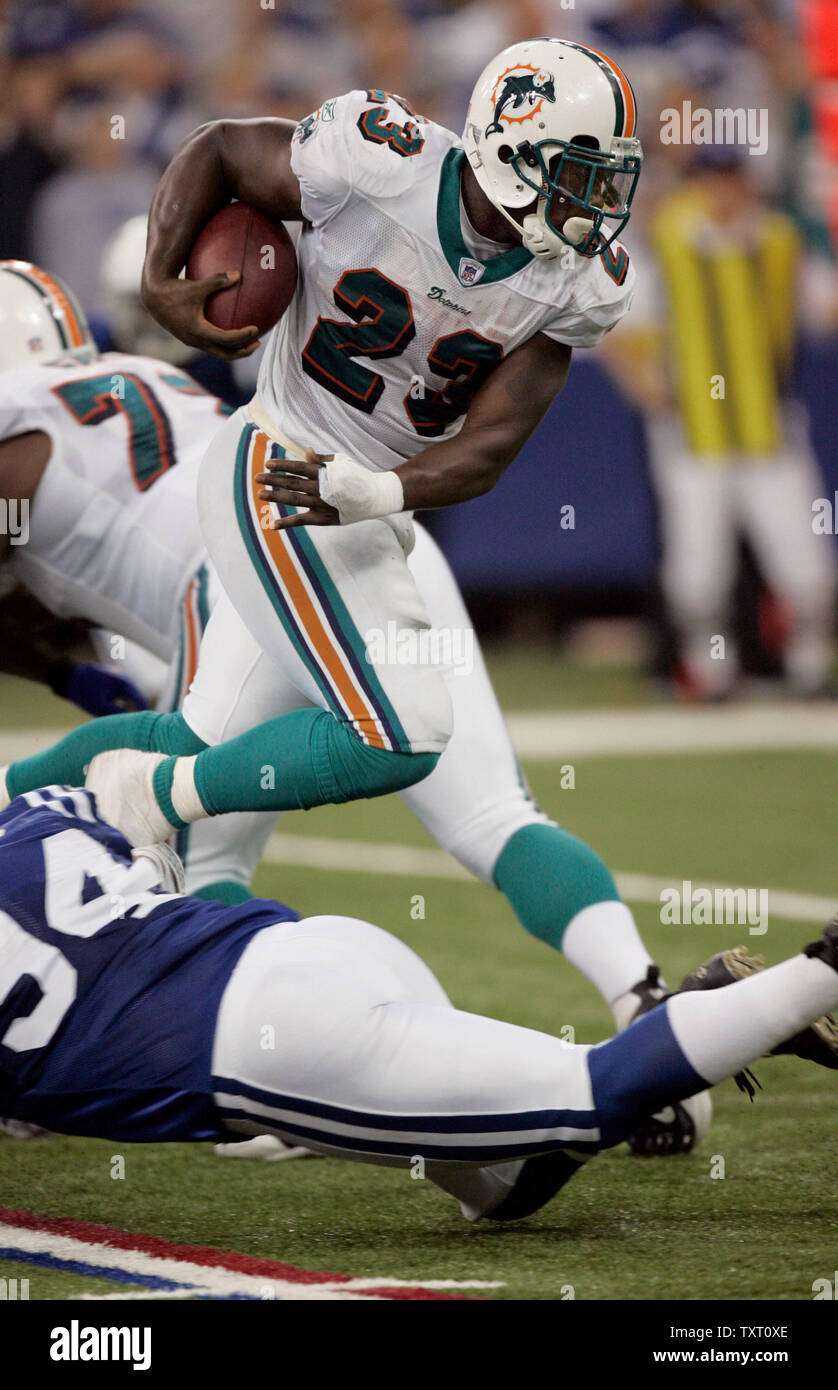 Miami Dolphins running back Ronnie Brown (23) hurdles Indianapolis Colts  linebacker Rob Morris (94) in the second half at the RCA Dome in  Indianapolis on December 31, 2006. The Colts defeated the