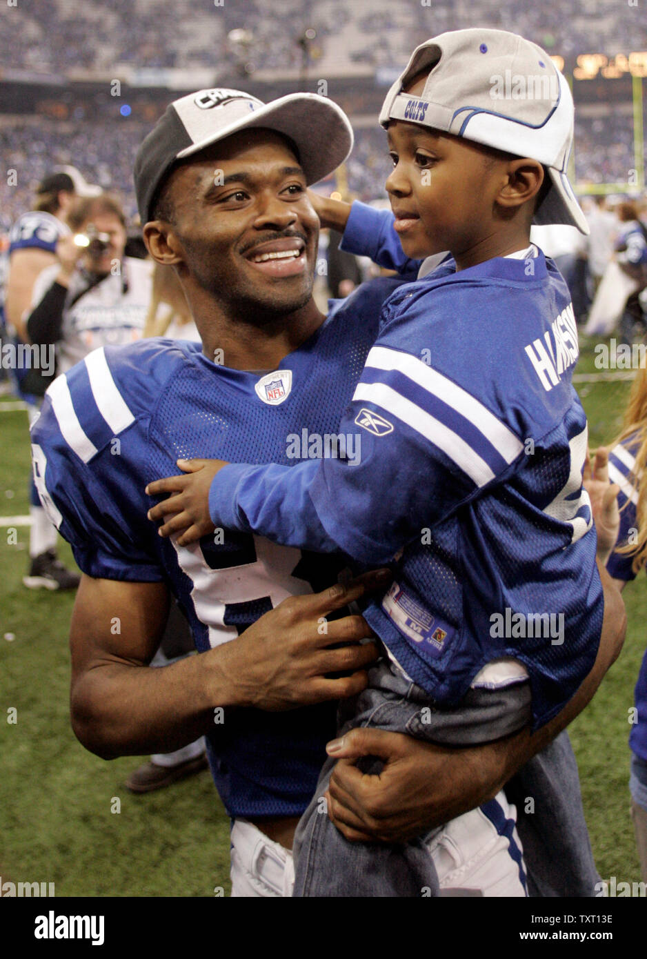indianapolis-colts-wide-receiver-marvin-harrison-88-holds-his-son-after-the-colts-defeated-the-new-england-patriots-38-34-in-the-afc-championship-game-at-the-rca-dome-in-indianapolis-on-january-21-2007-upi-phototom-strattman-TXT13E.jpg