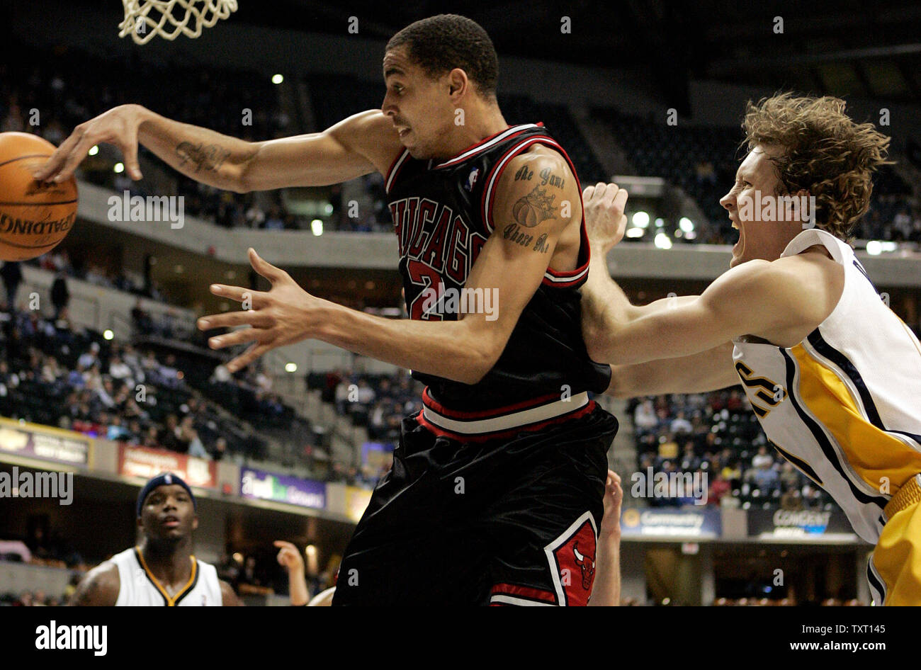 Chicago Bulls guard Thabo Sefolosha (2), from Switzerland, passes the ball away from Indiana Pacers guard Mike Dunleavy (17) at Conseco Fieldhouse in Indianapolis January 22, 2007. The Pacers defeated the Bulls 98-91. (UPI Photo/Mark Cowan) Stock Photo