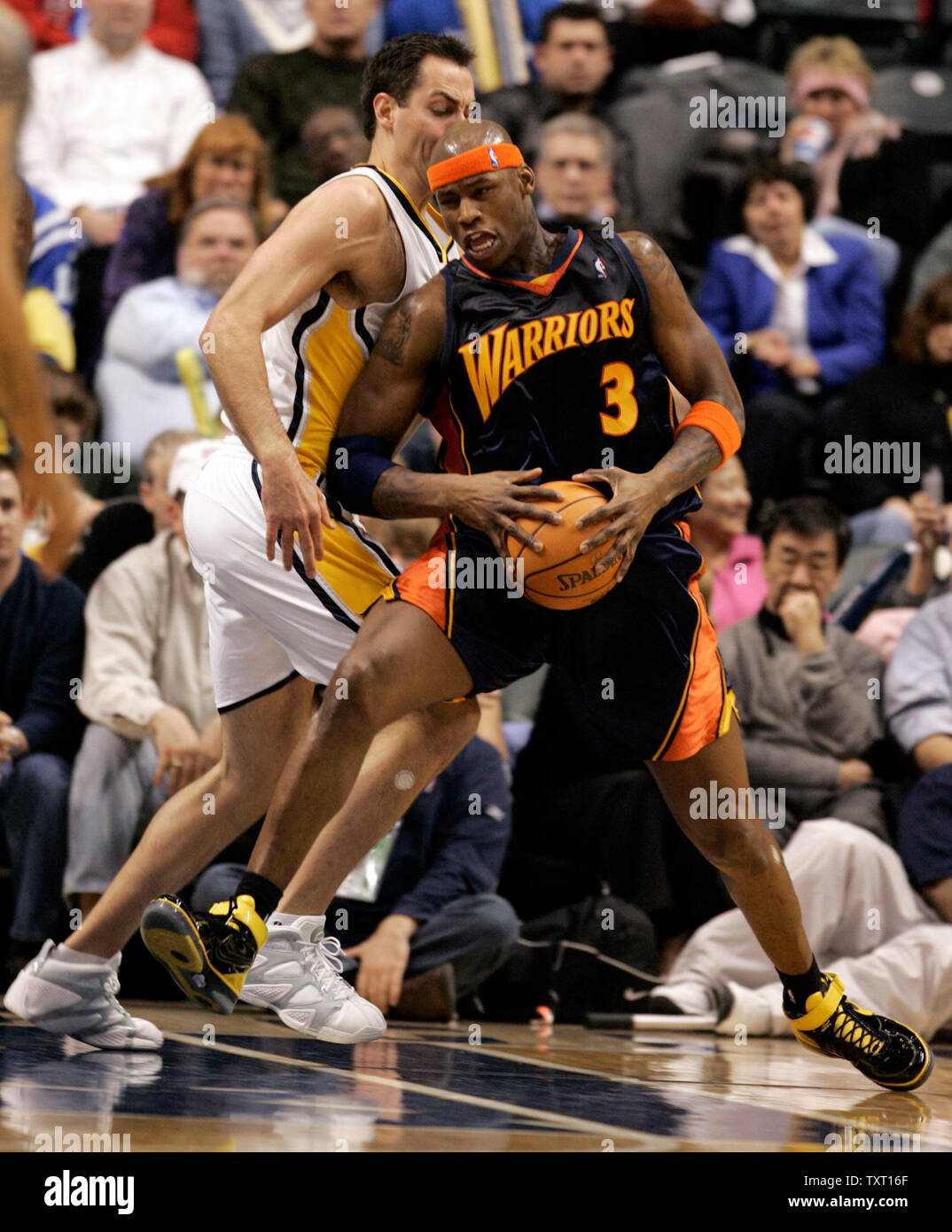 Golden State Warriors forward Al Harrington (3) drives around Indiana Pacers center Jeff Foster (10) at Conseco Fieldhouse in Indianapolis February 5, 2007. Golden State defeated the Pacers 113-98. (UPI Photo/Mark Cowan) Stock Photo