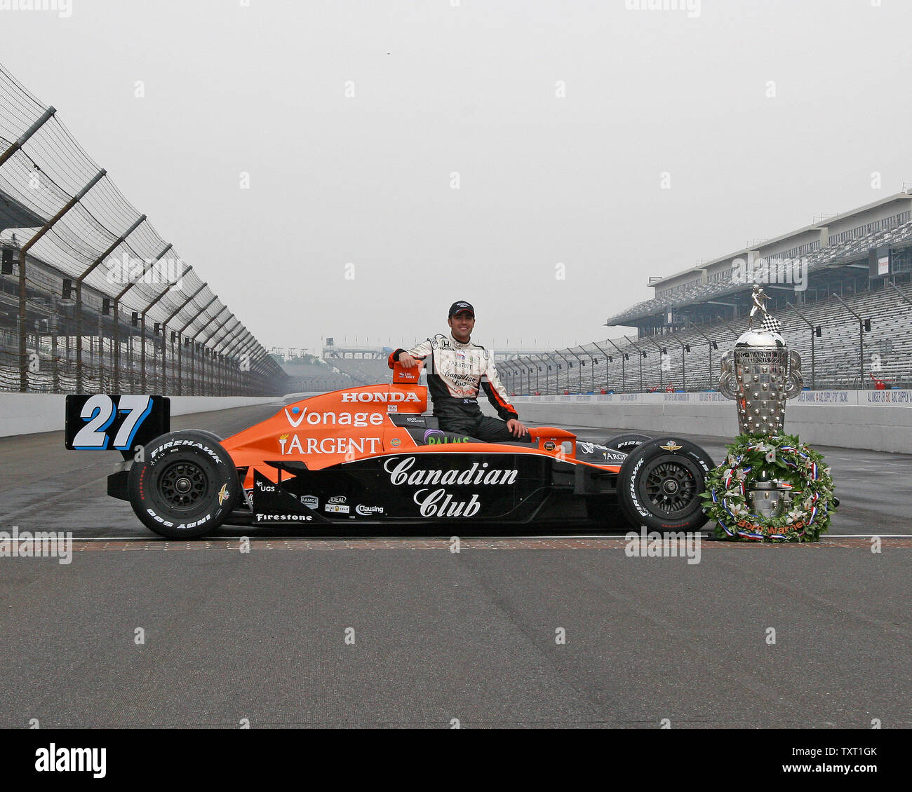 2007 Indianapolis 500 winner Dario Franchitti poses at the start finish line with the Borg-Warner Trophy on May 28, 2007 at the Indianapolis Motor Speedway in Indianapolis, IN.  Franchitti won the rain shortened 91st Indianapolis 500 (UPI Photo/ Mike Bryand) Stock Photo