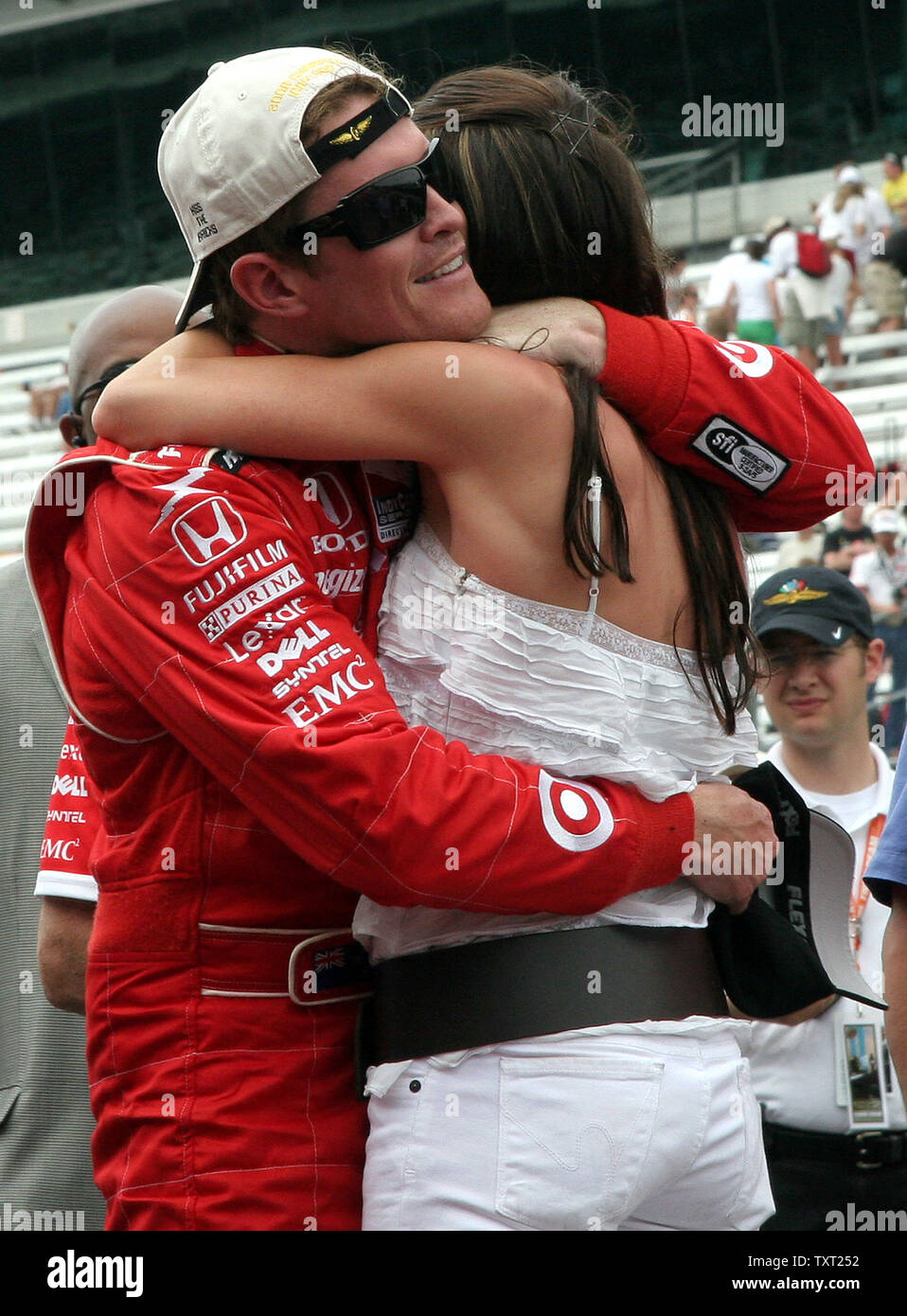 Scott Dixon, from New Zealand, hugs his wife Emma at the finish line after winning the 92nd running of the Indianapolis 500 at the Indianapolis Motor Speedway on May 25, 2008 in Indianapolis. (UPI Photo/Mike Bryan) Stock Photo