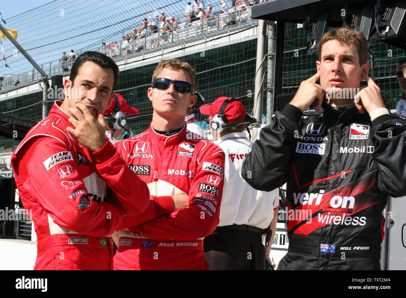Team Penske drivers Helio Castroneves, Ryan Briscoe and Will Power seem to be posing the 'Speak no Evil, See no Evil, Hear no Evil during practice for the final weekend of qualifications on May 14, 2009 at the Indianapolis Motor Speedway in Indianapolis, Indiana. (UPI Photo/Ed Locke) Stock Photo