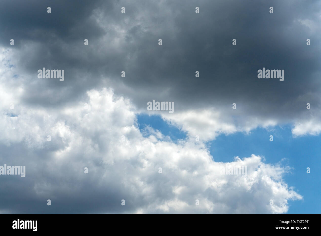 Dark storm clouds against blue sky. Sky before the storm Stock Photo ...